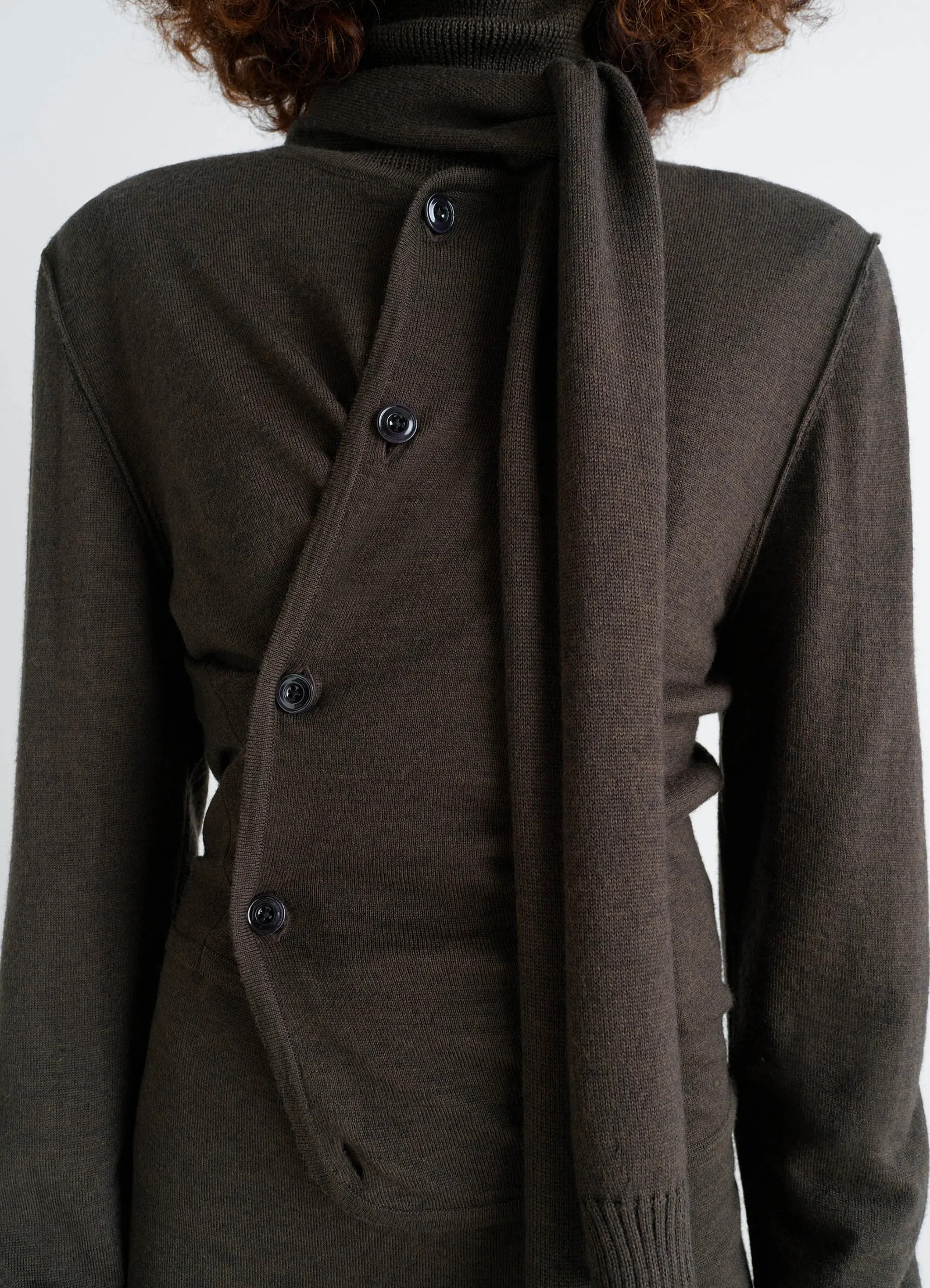 Lemaire twisted cardigan in blended merino wool, model shot, close-up angle integrated scarf detail