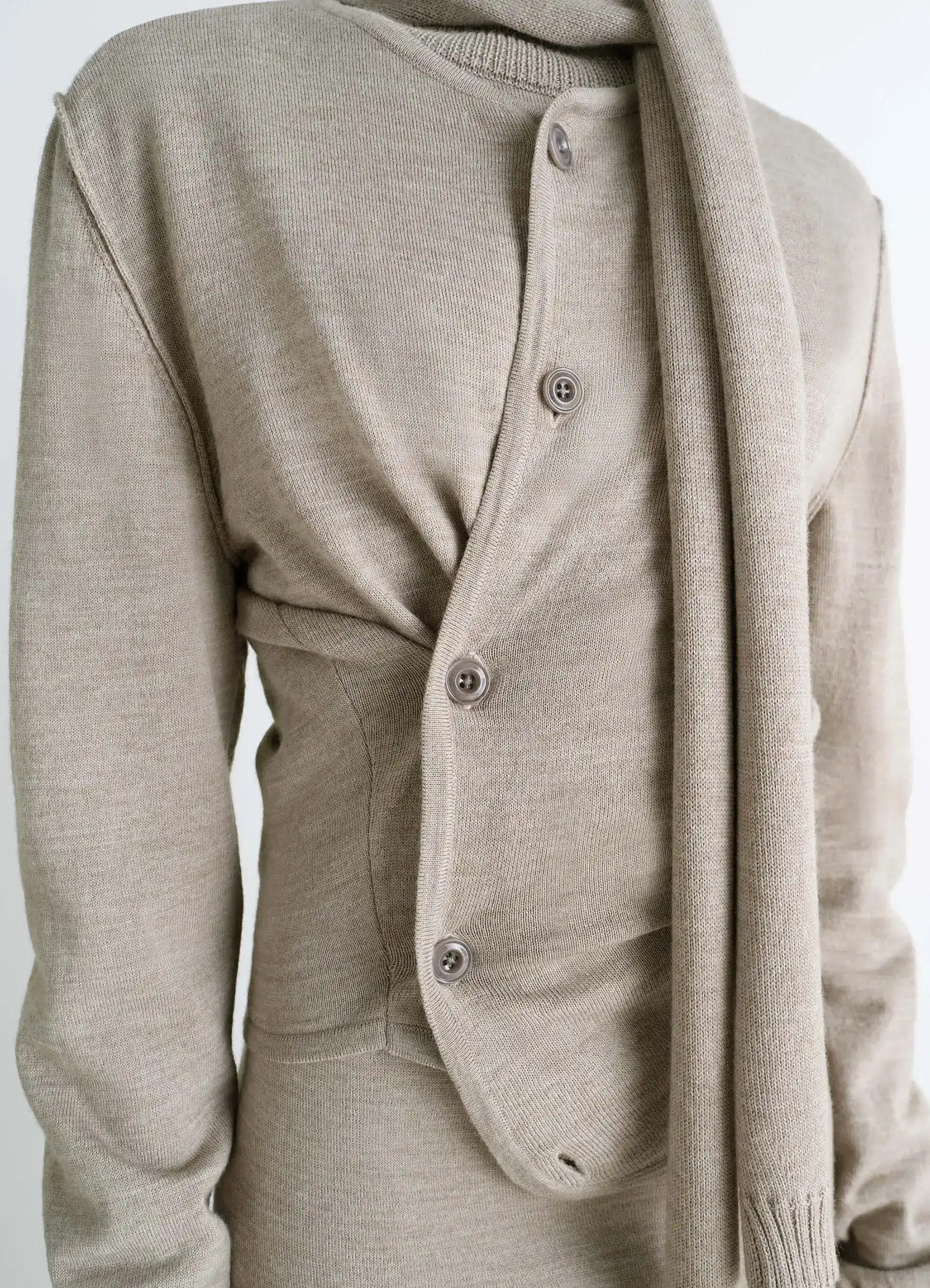 Twisted cardigan with scarf in blended merino wool, model shot, close-up side view twist detail texture