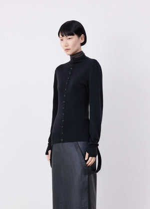 Lemaire Fitted Seamless Cardigan in Black Merino Wool, model shot, Side front view Fitted with thumbholes