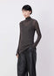 EMO Seamless High Neck Top in Dark Brown Viscose Silk, model shot, Front three-quarter view Finely ribbed see-through