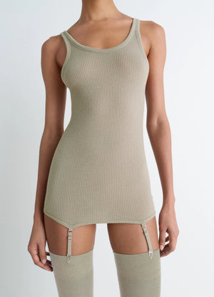 Lemaire Seamless Tank Top in Beige Ribbed Merino Wool, model shot, Front view Fitted with suspenders