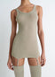 Lemaire Seamless Tank Top in Beige Ribbed Merino Wool, model shot, Front view Fitted with suspenders