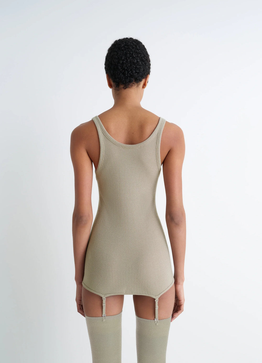 Lemaire Seamless Tank Top in Beige Ribbed Merino Wool, model shot, back view ribbed seamless tank
