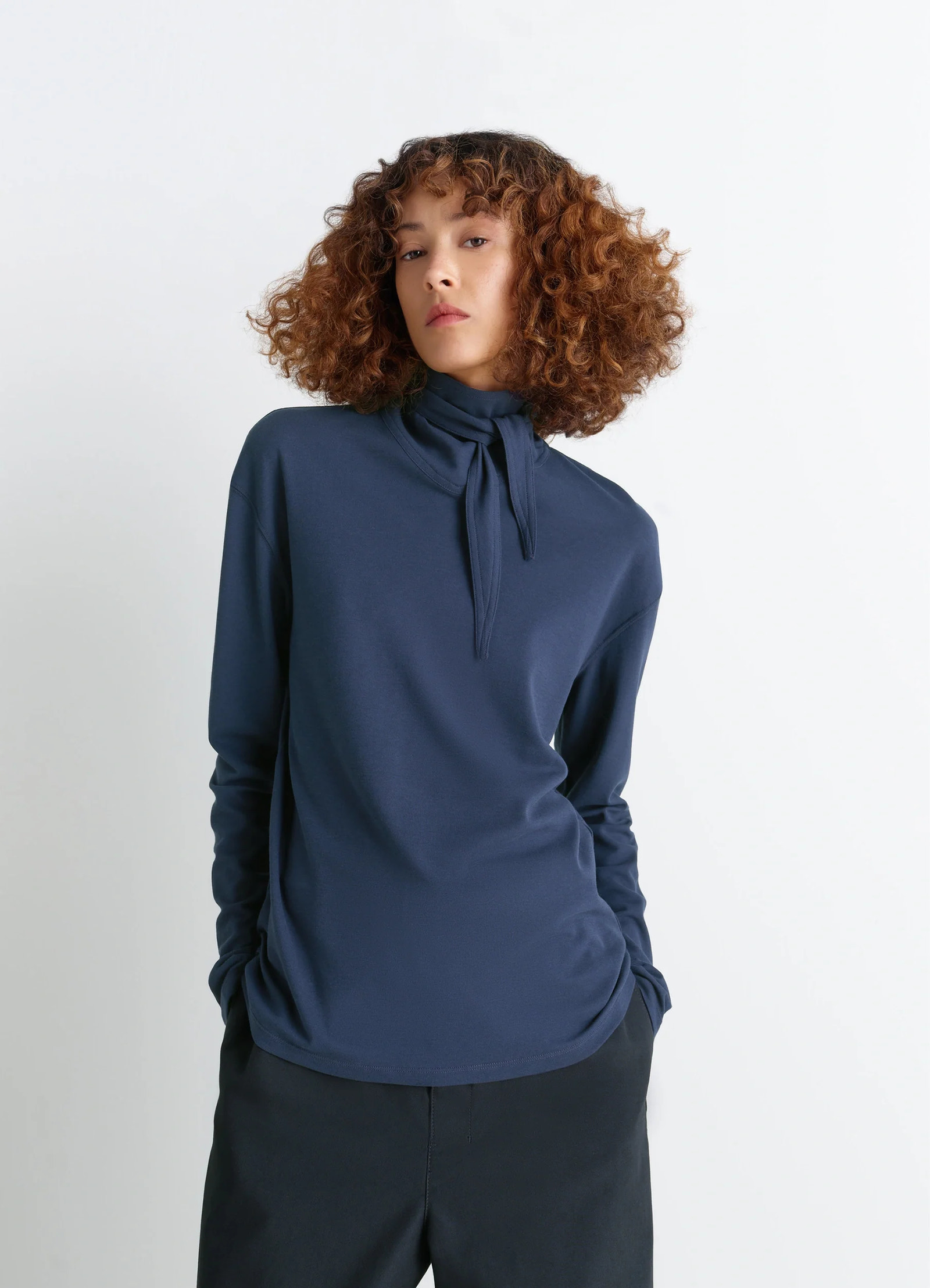 Lemaire long sleeve foulard top in soft-touch crepe jersey, model shot, front view scarf detail, fitted cut