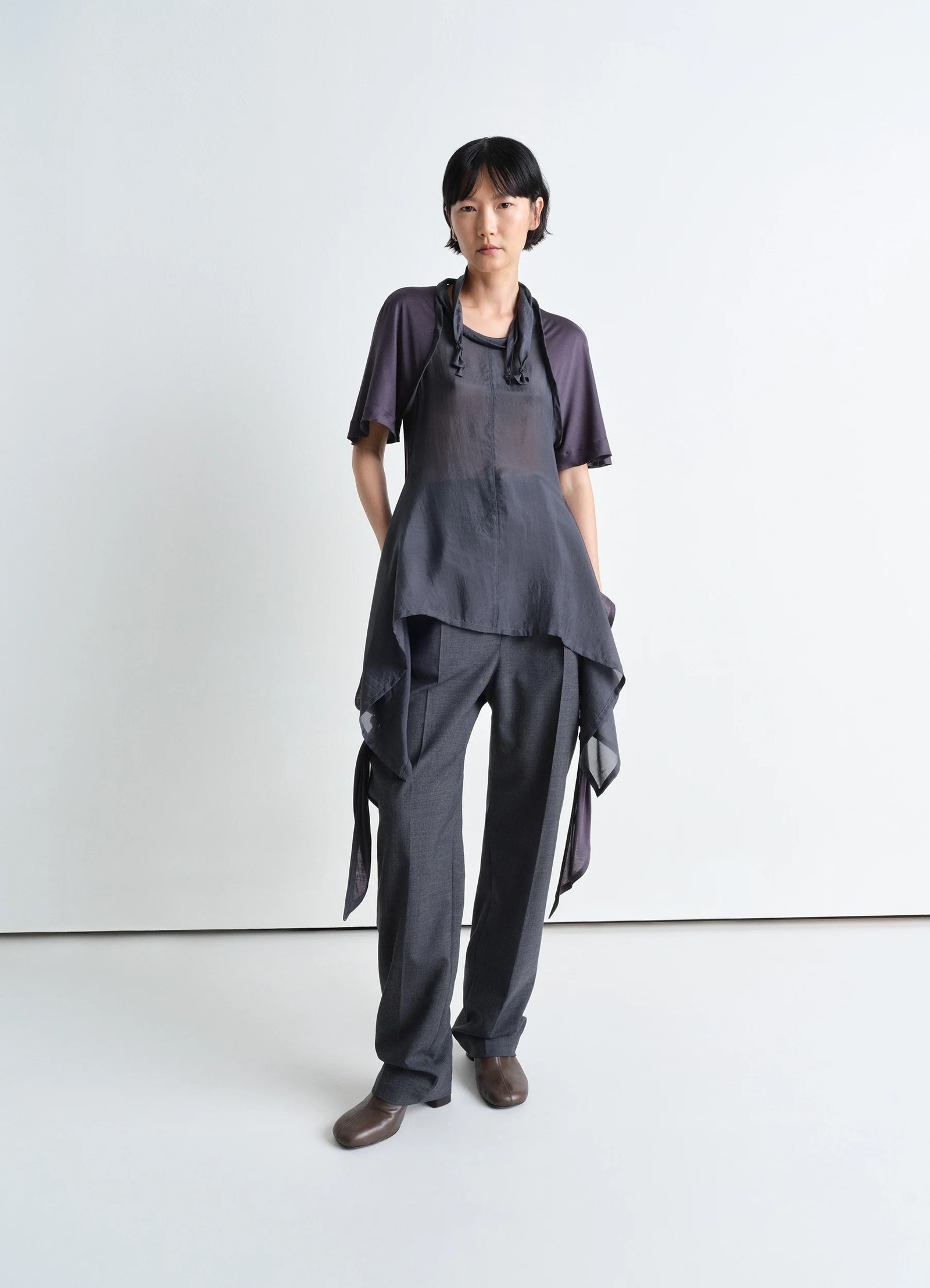 Lemaire mixed fabric knotted top in silk chiffon and jersey, model shot, front view knot details and panels
