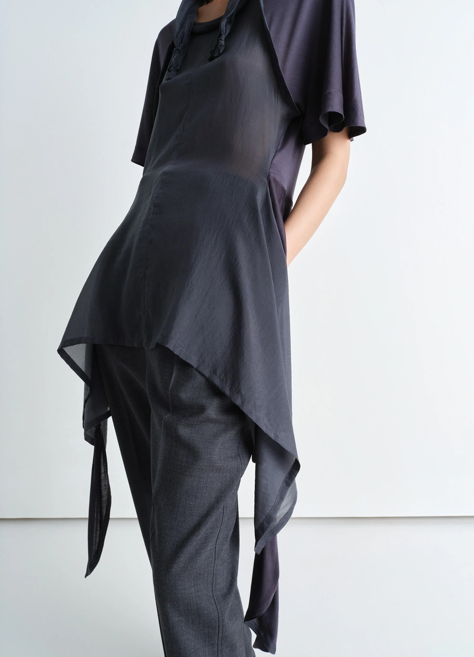 Lemaire mixed fabric knotted top in silk chiffon and jersey, model shot, side view asymmetrical hem