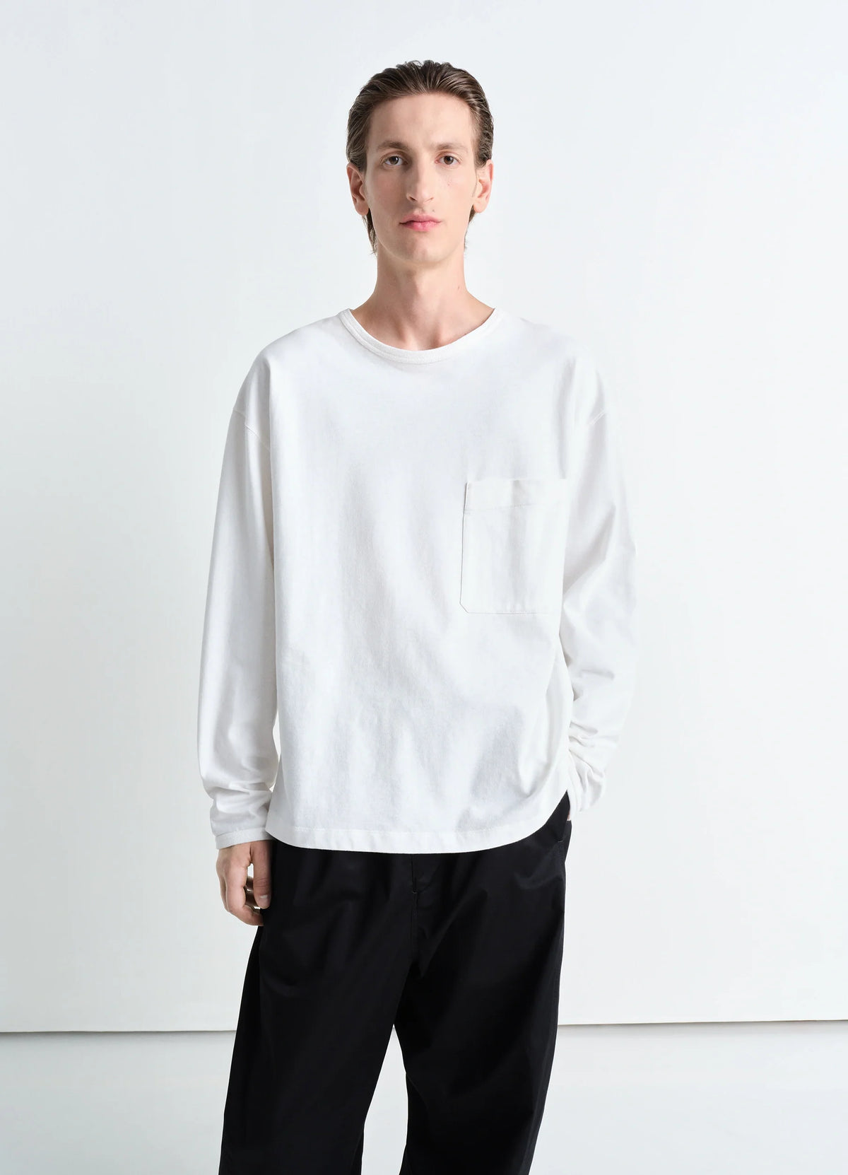 Lemaire Boxy Long Sleeve T-Shirt in White Linen Cotton Jersey, model shot, Front view Relaxed fit with pocket