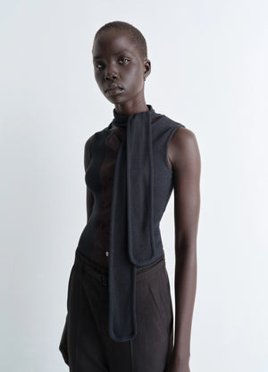 Asymmetrical fitted top in cotton lined rib jersey, model shot, front view sleeveless with neck scarf