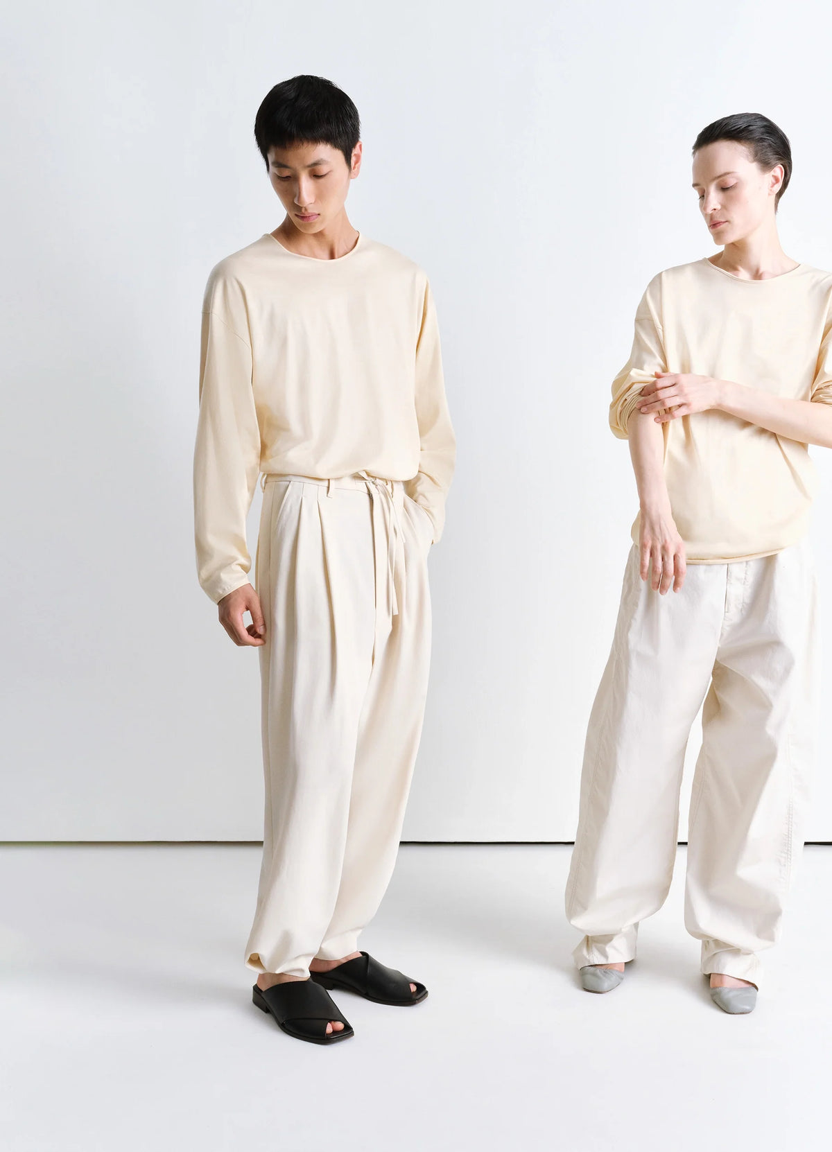 Lemaire Long Sleeve Relaxed Tee in Light Cotton Jersey in Cream, model shot, Front view Relaxed fit with ribbed cuffs