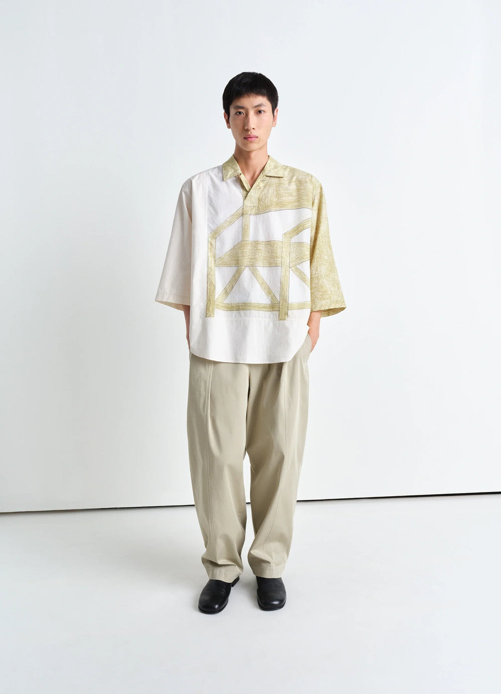 Philippe Weisbecker Short Sleeve Po in Light cotton pattern, model shot, Front view Three-quarter sleeves, curved hem