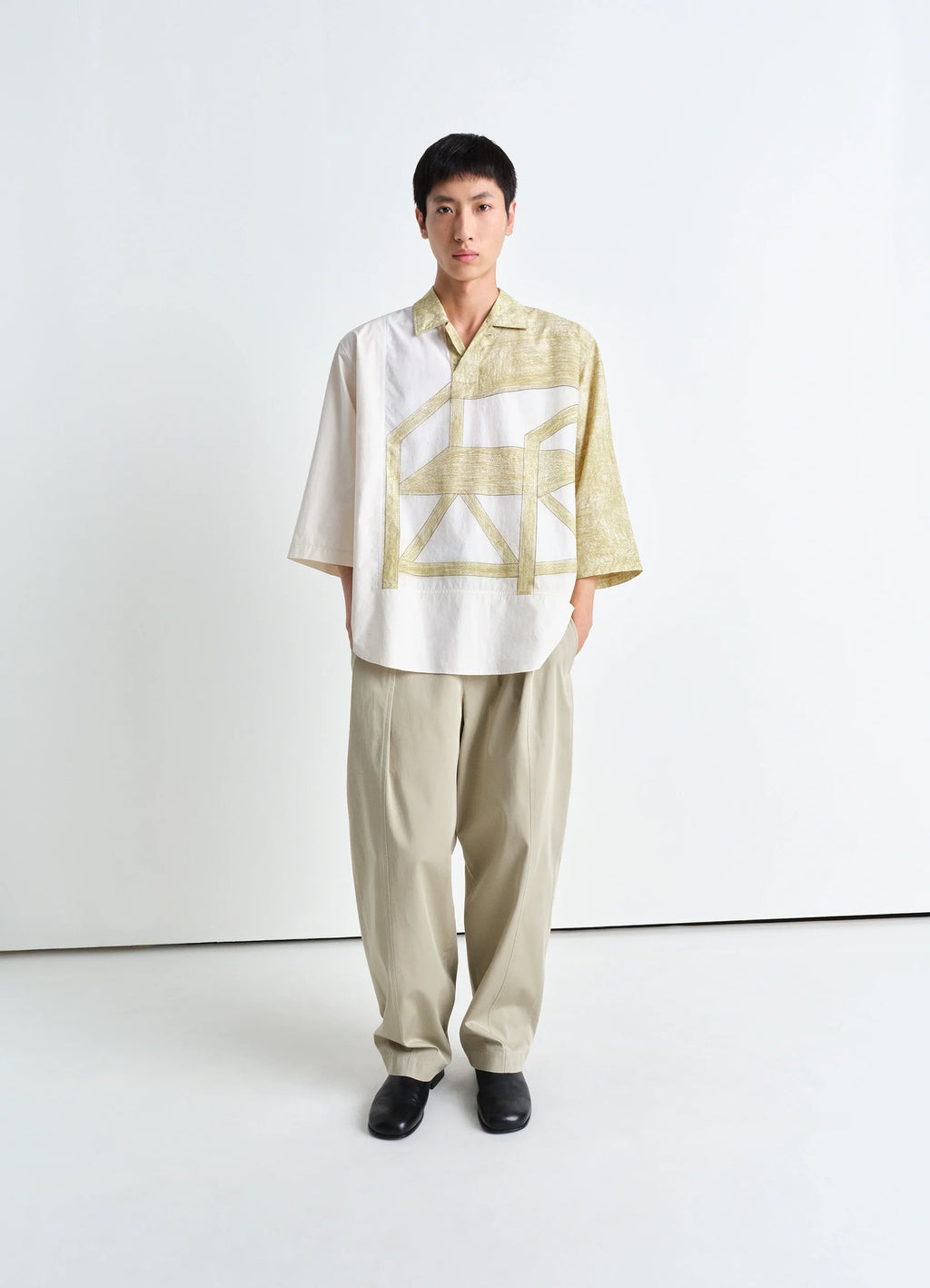 Philippe Weisbecker Short Sleeve Po in Light cotton pattern, model shot, Front view Three-quarter sleeves, curved hem