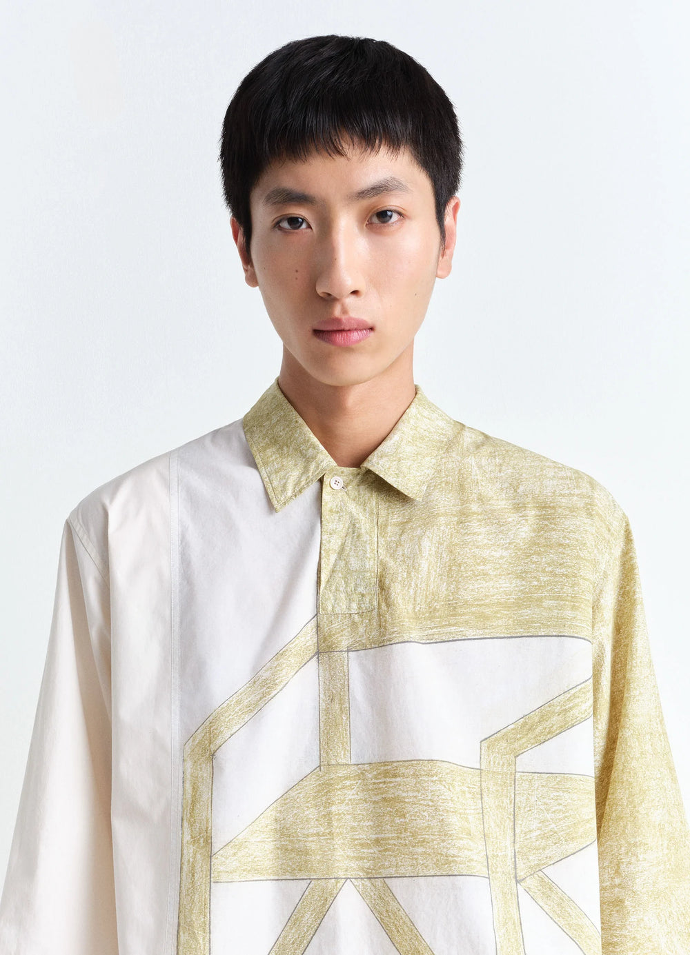 Philippe Weisbecker Short Sleeve Po in Light cotton pattern, model shot, close-up view half-button placket