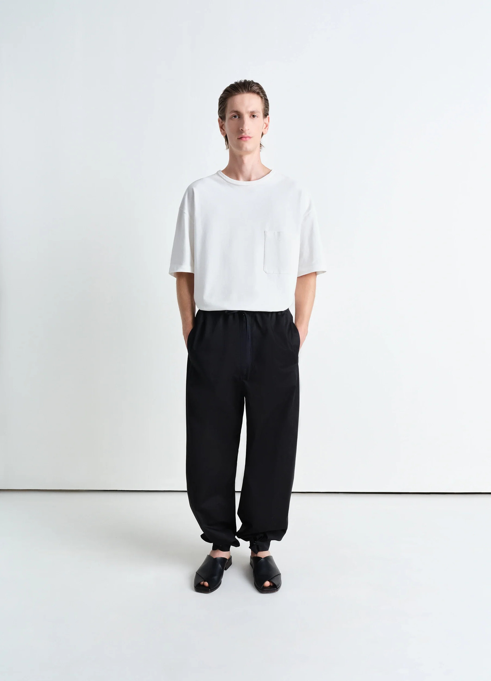 Lemaire boxy short sleeve t-shirt in white linen cotton jersey, model shot, full body view boxy fit, casual wear