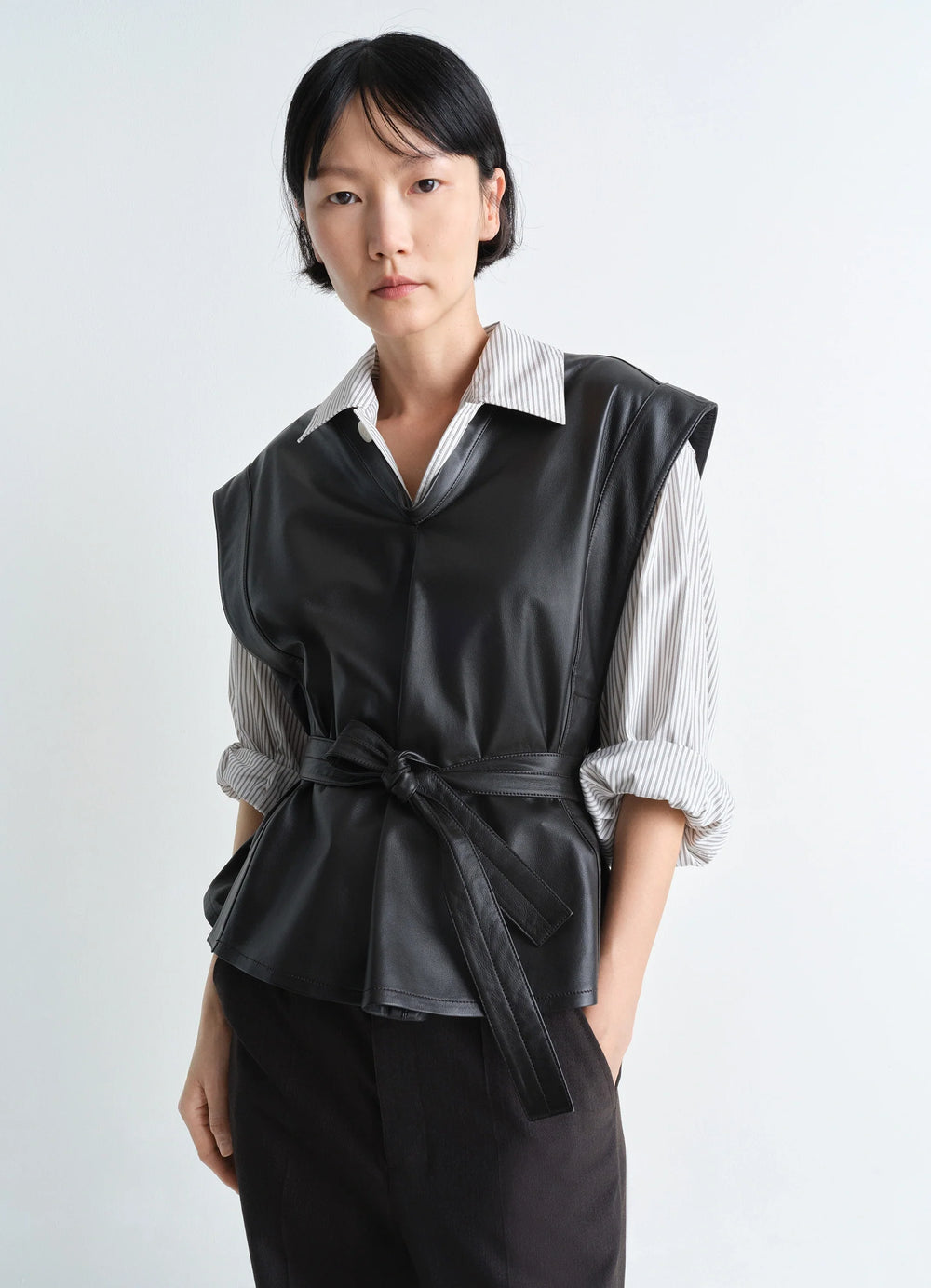 Lemaire Leather Chasuble in Light Lamb Leather, model shot, Front view V-neck with belt