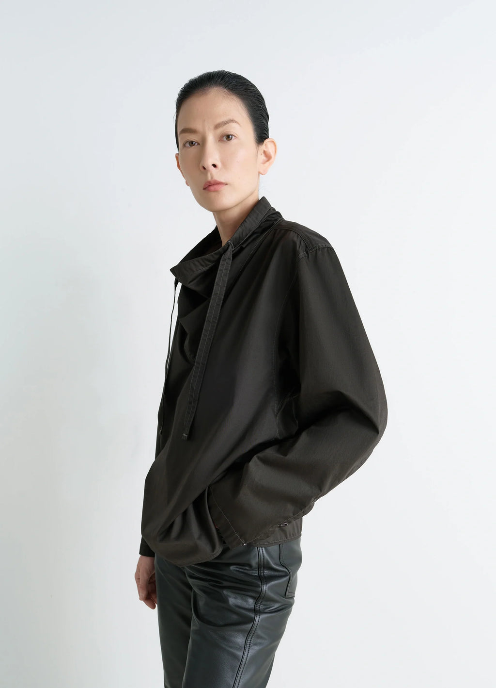 VAREUSE TOP - Lemaire in Dark Cotton Satin, model shot, side view loose fit, asymmetrical collar