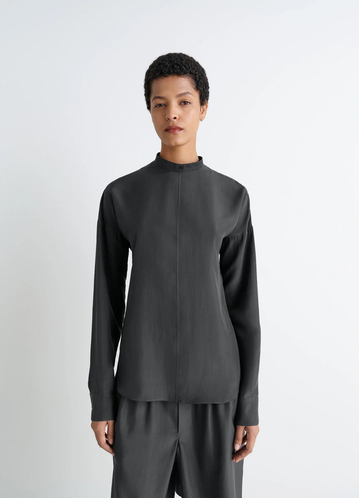Light Plastron Top in Black Silk Pongee, model shot, Front view Buttoned back, fluid