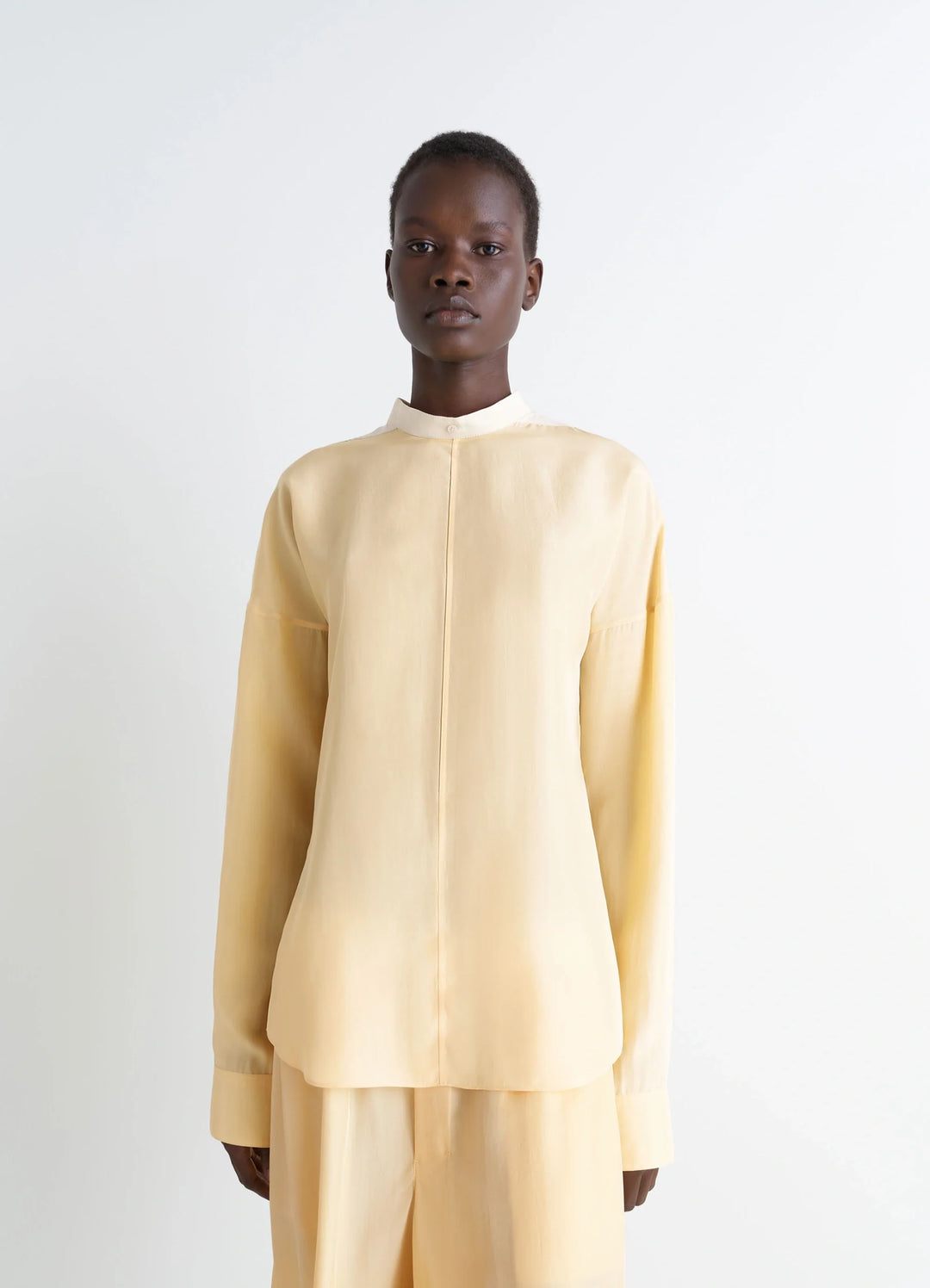 Light Plastron Top in Silk Pongee, model shot, Front View Buttoned Back, Long Sleeve
