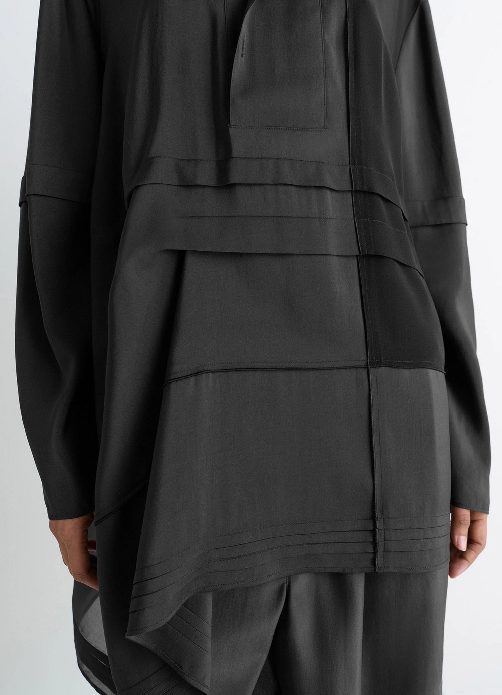 Blouse with Pleats in Black Patchwork Crepe de Chine, model shot, back detail shot layered hem accent