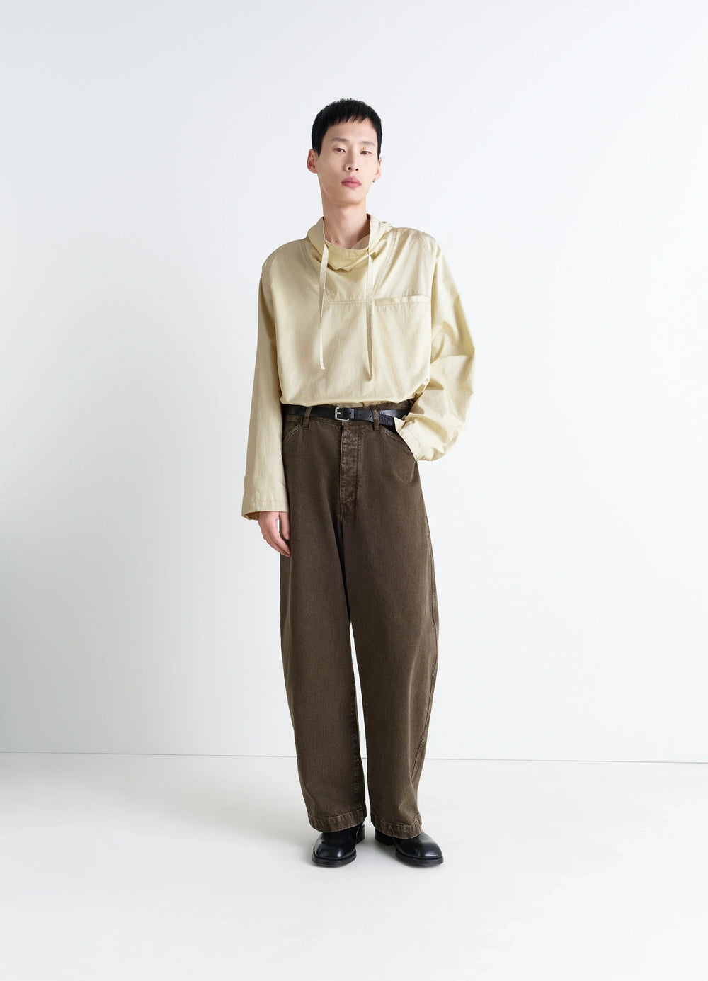 Lemaire Funnel Neck Vareuse in Lightweight Cotton Satin, model shot, three-quarter view relaxed cut