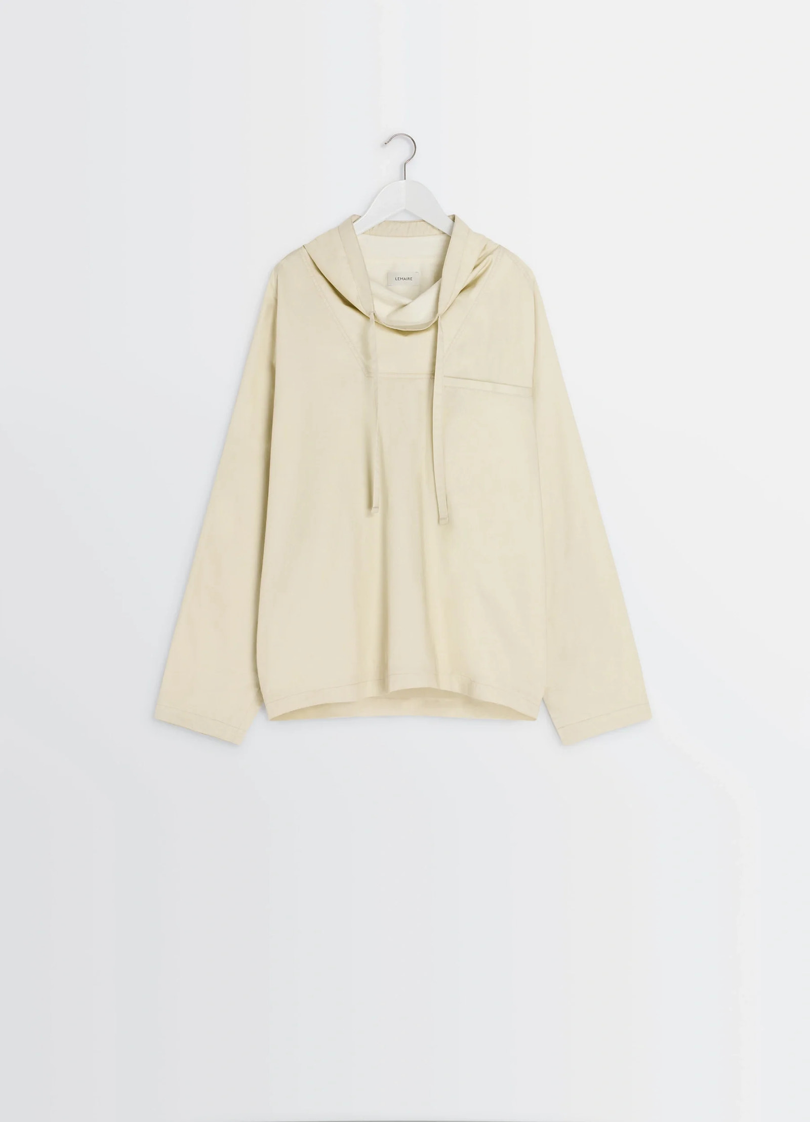 Lemaire funnel neck vareuse in lightweight cotton satin, product shot, hanger shot long sleeve, drawstring funnel