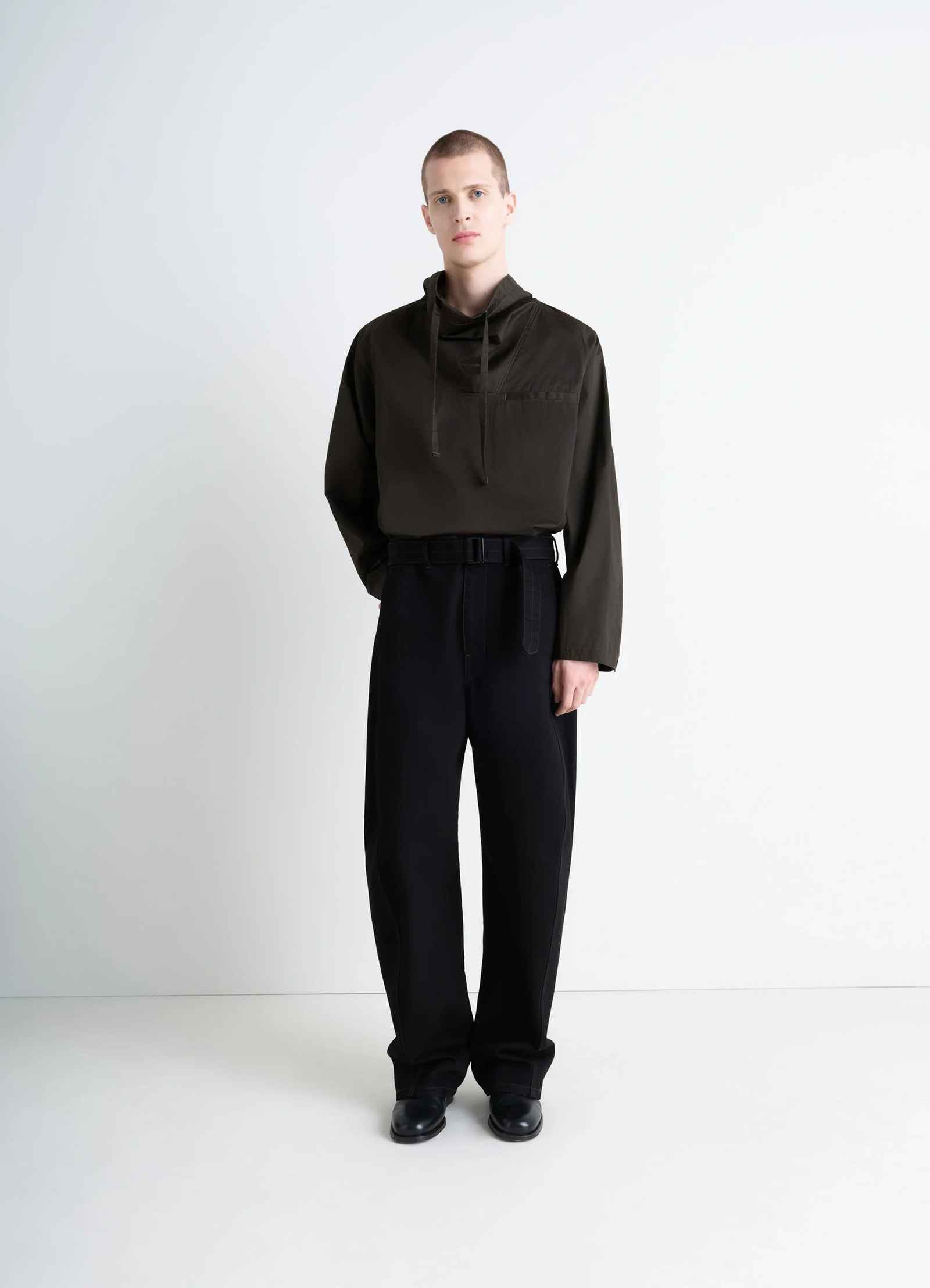 Lemaire funnel neck vareuse in dark olive lightweight cotton, model shot, three-quarter view dropped shoulders