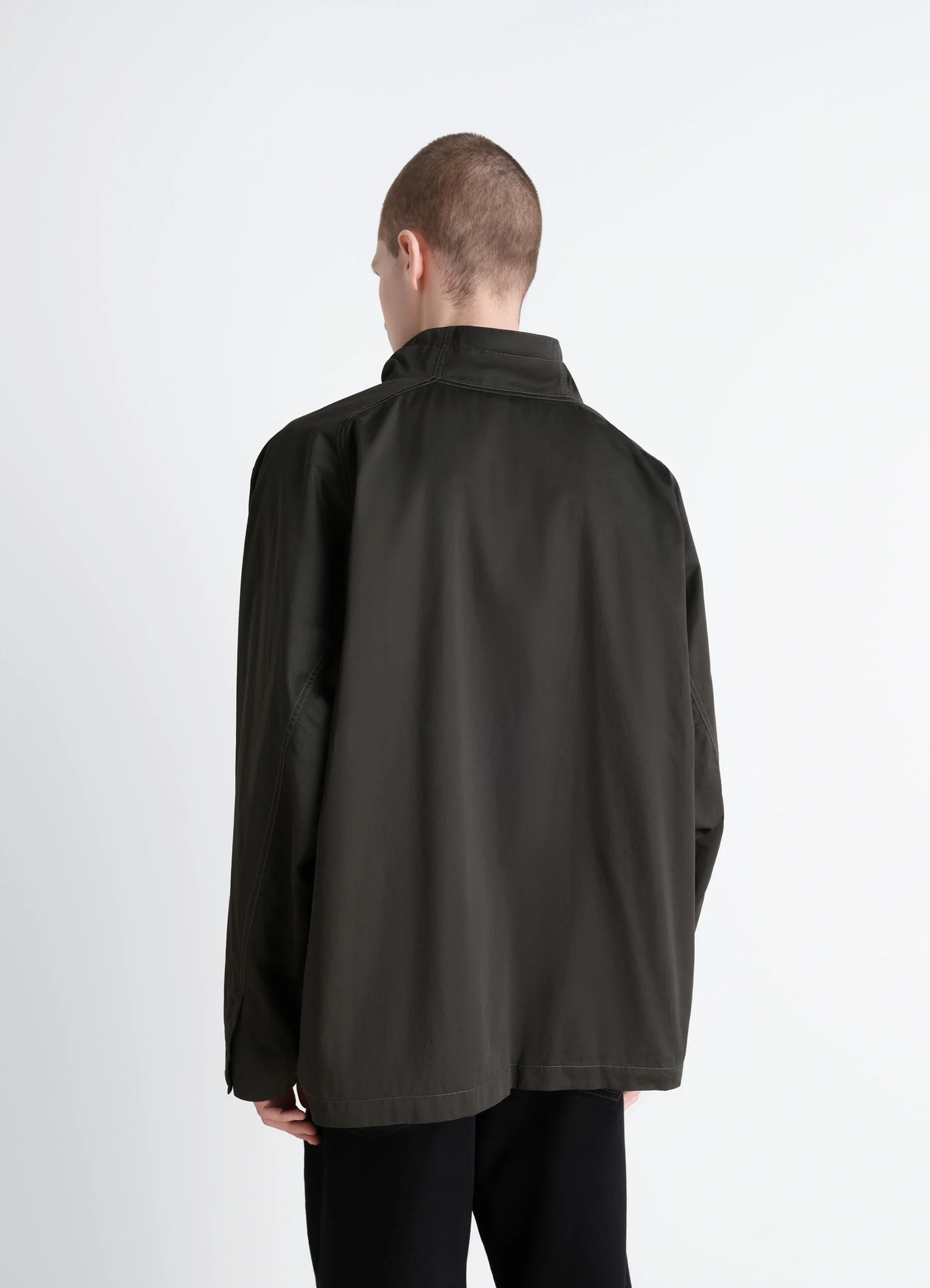 Lemaire funnel neck vareuse in dark olive lightweight cotton, model shot, back view relaxed fit