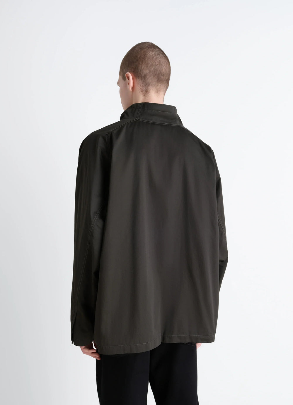Lemaire Funnel Neck Vareuse in Dark Olive Lightweight Cotton, model shot, back view relaxed fit
