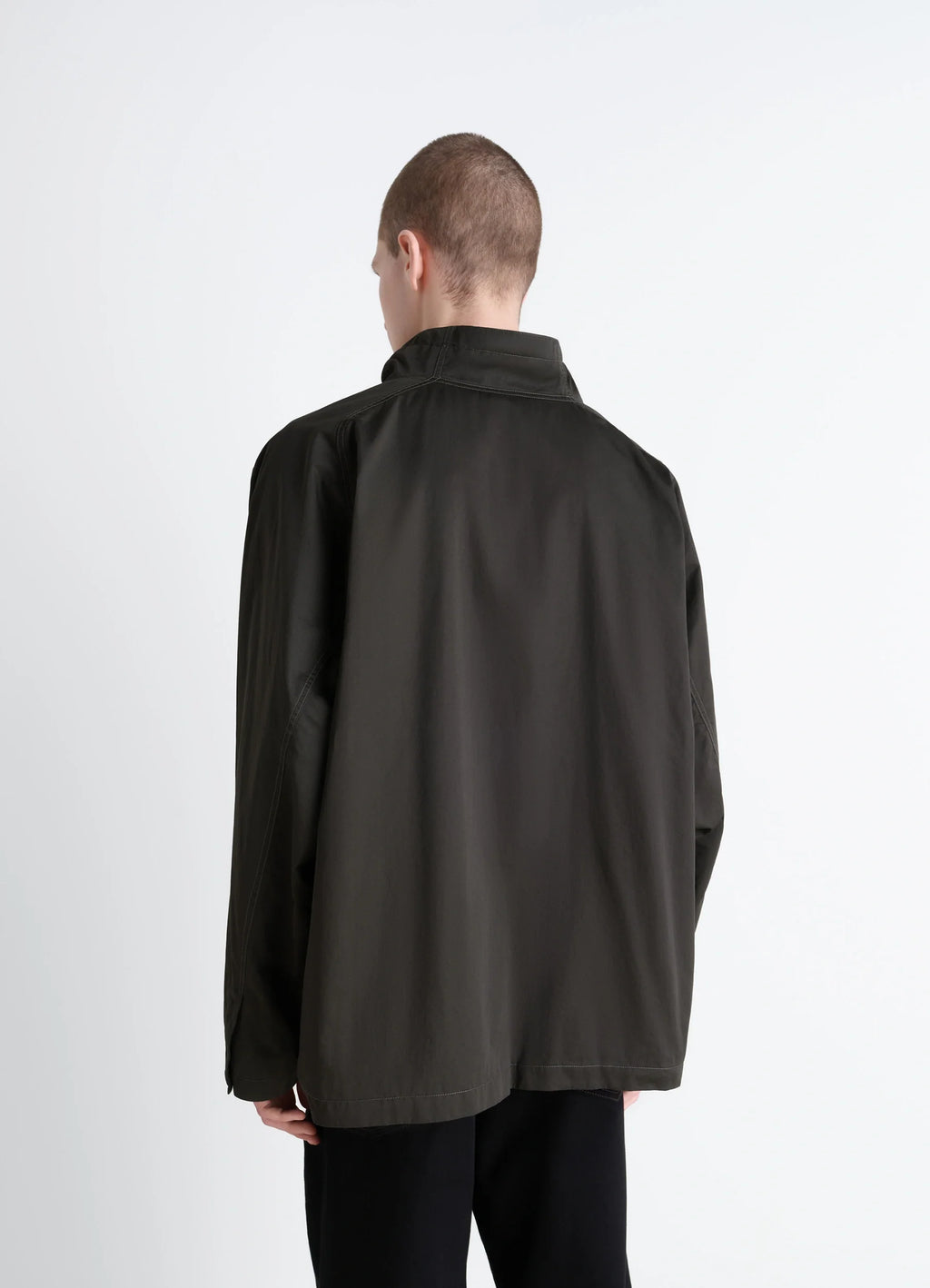 Lemaire Funnel Neck Vareuse in Dark Olive Lightweight Cotton, model shot, back view relaxed fit