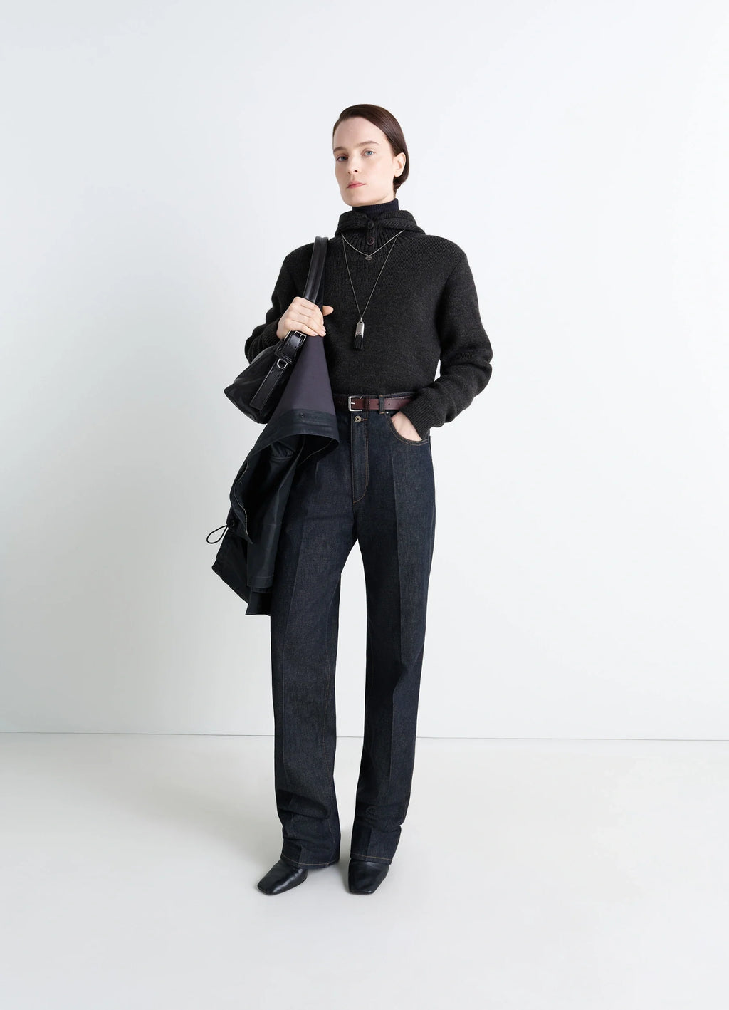 Lemaire Button-Down Hooded Sweater in Charcoal Wool Alpaca Blend, model shot, three-quarter view hooded design with fold