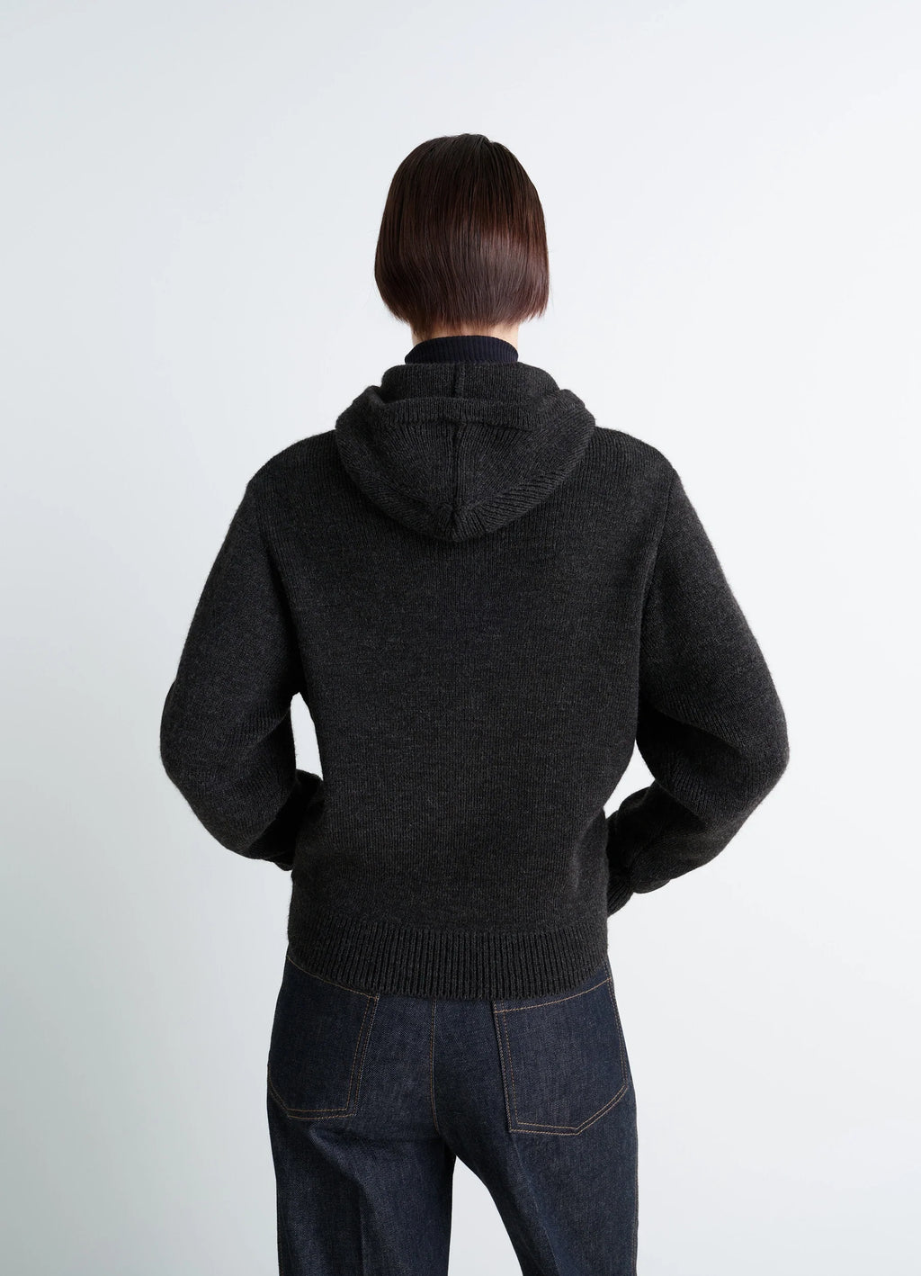 Lemaire Button-Down Hooded Sweater in Charcoal Wool Alpaca Blend, model shot, back view ribbed hem, fitted cuffs