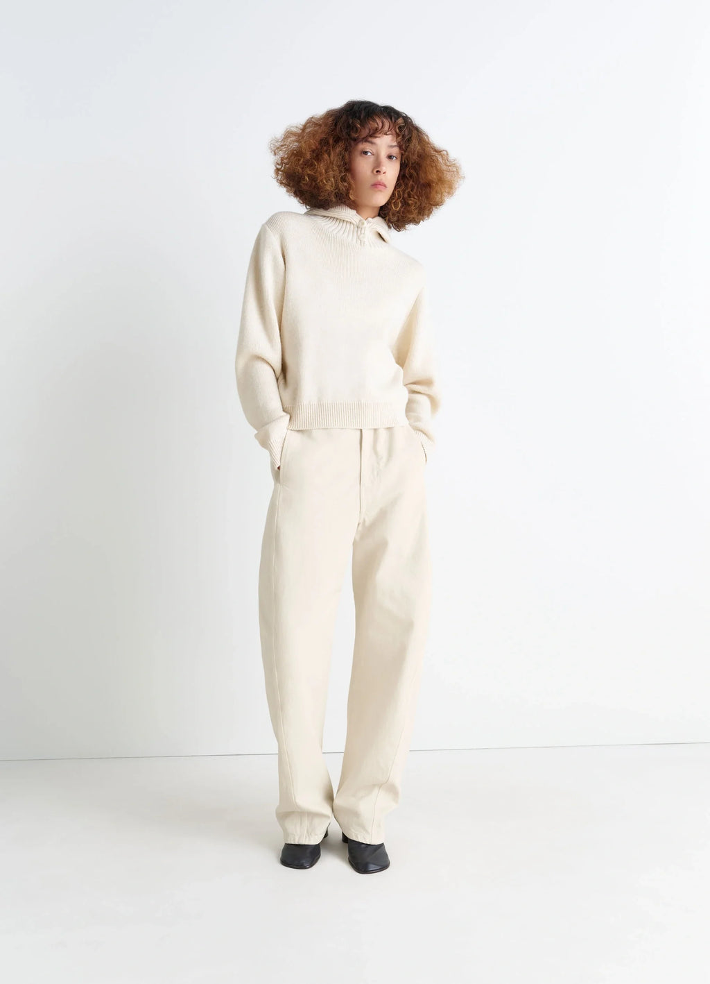 Lemaire Hooded Sweater in Cream Wool Alpaca Blend, model shot, side angle oversized fit