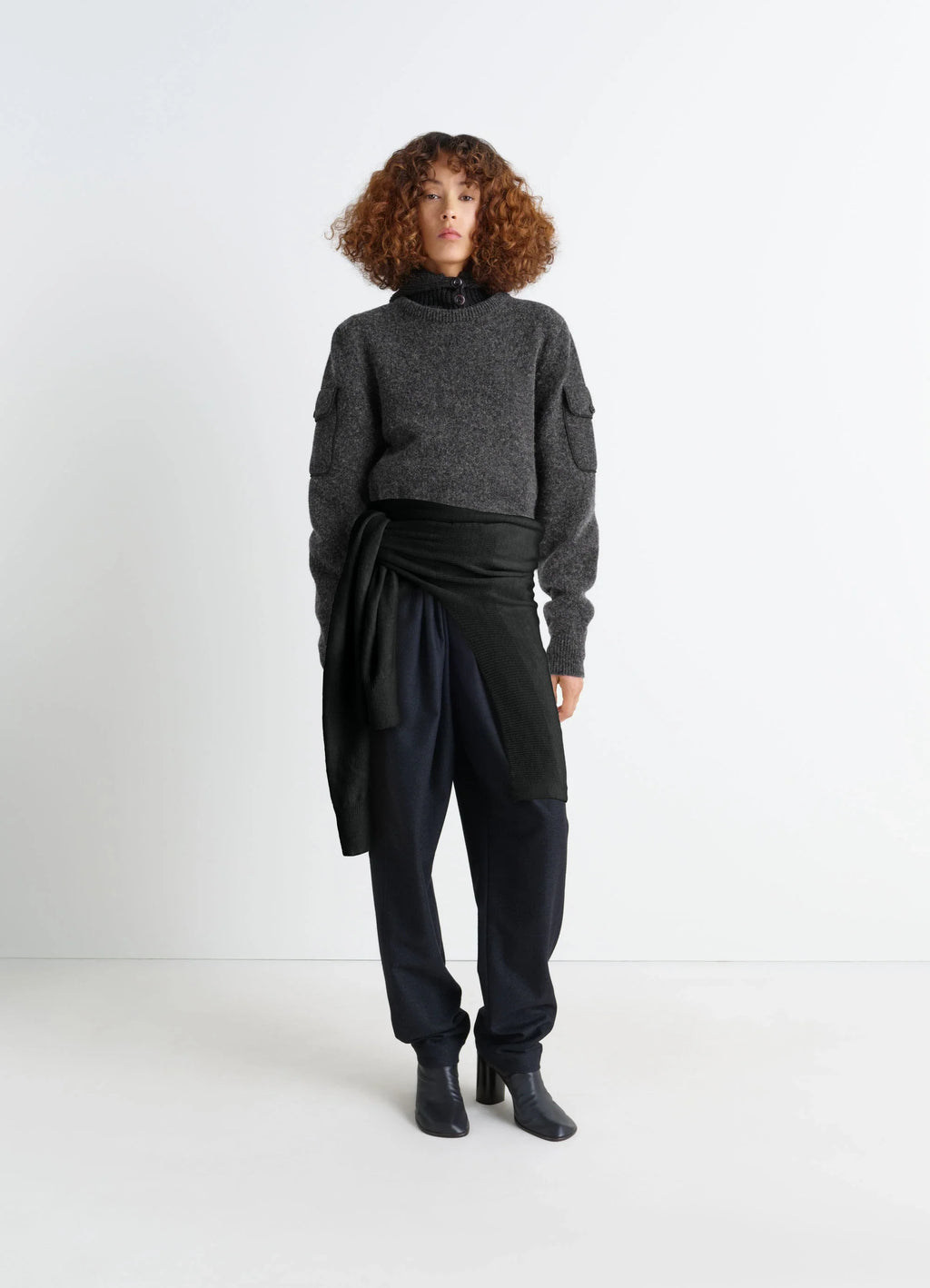 SWEATER WITH POCKETS in Shetland wool grey, model shot, front view pockets on sleeves