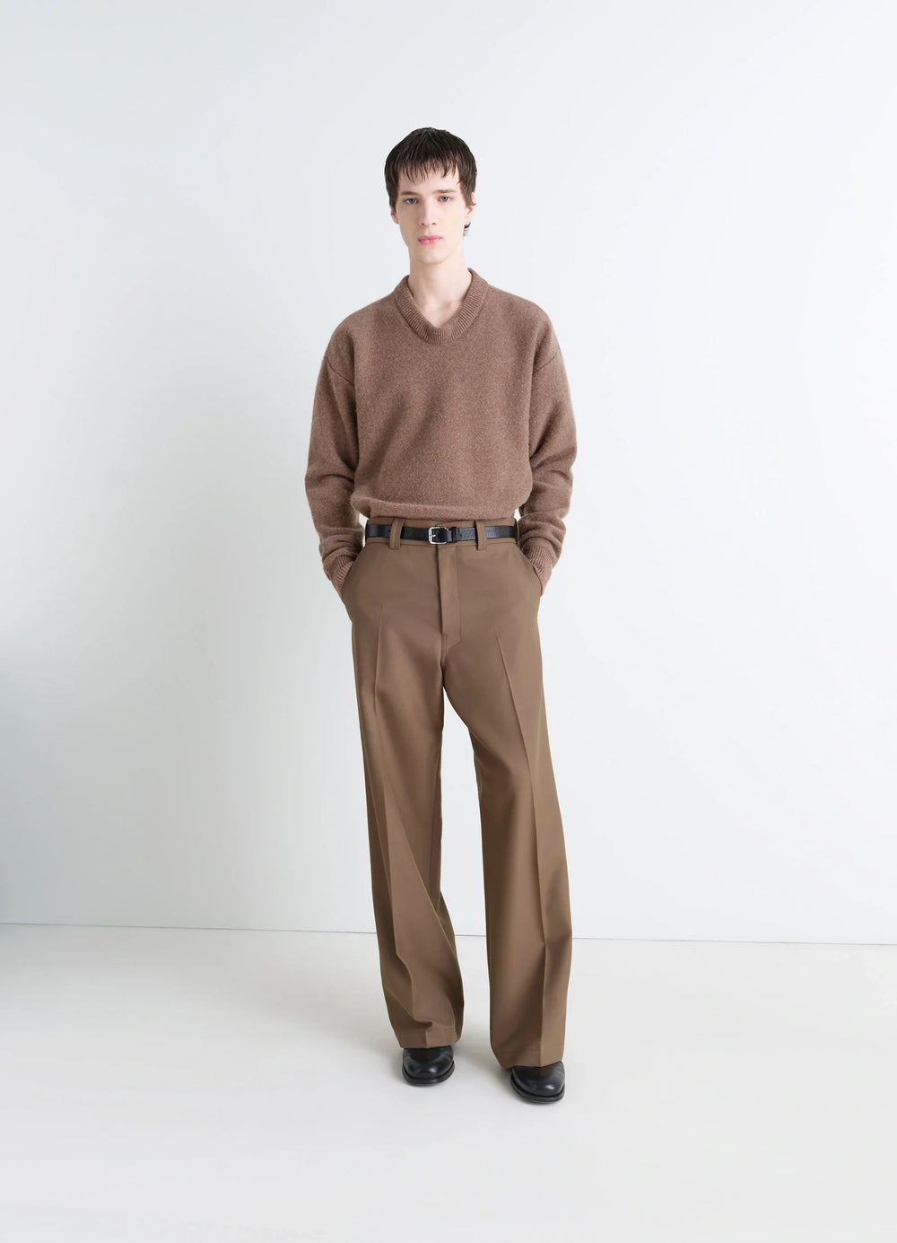 Boxy V Neck Sweater in Shetland Wool, model shot, 3/4 front view ribbed cuffs