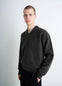 Crafted Boxy Sweater in Shetland Wool, model shot, front side view boxy V neck