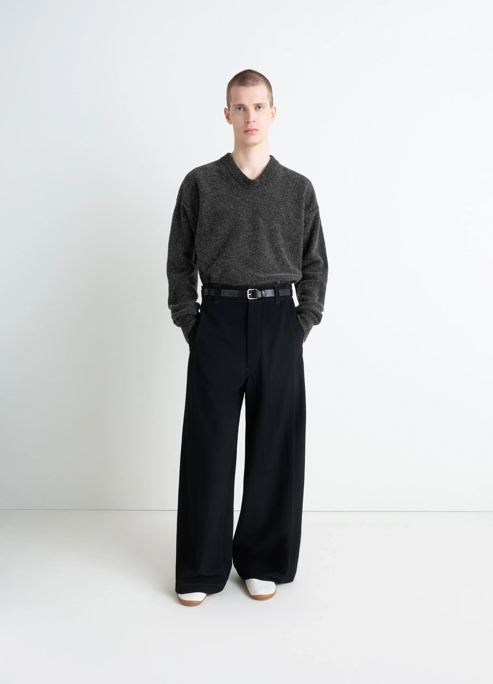 Crafted boxy sweater in shetland wool, model shot, full body view knit texture v neckline