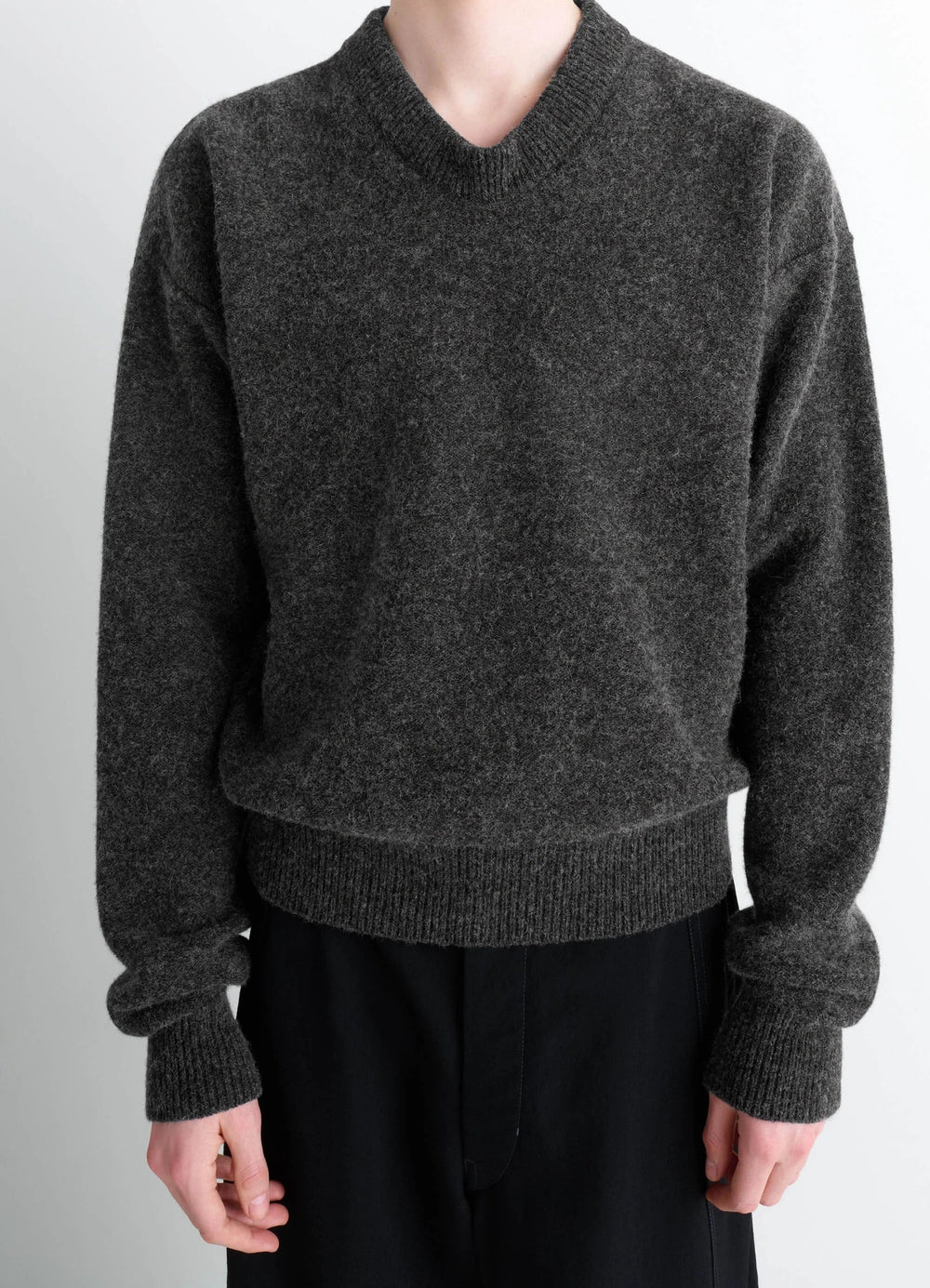Crafted Boxy Sweater in Shetland Wool, model shot, upper body view ribbed hem and cuffs
