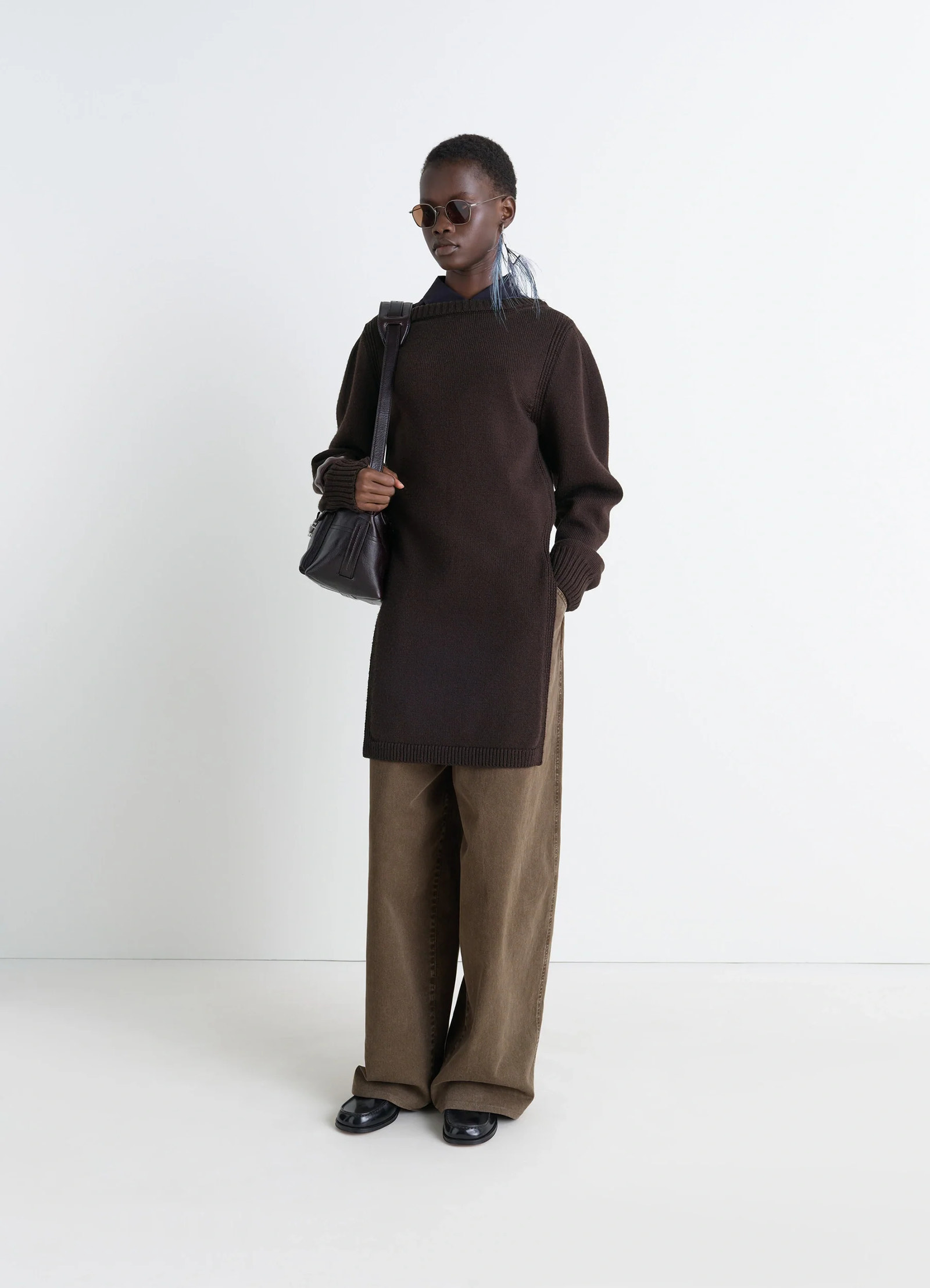Sweater with slits in dark brown combed wool, model shot, front view long slit design