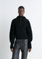 Zipped Sweater in Black Combed Wool, model shot, Front view Half-zip knit texture