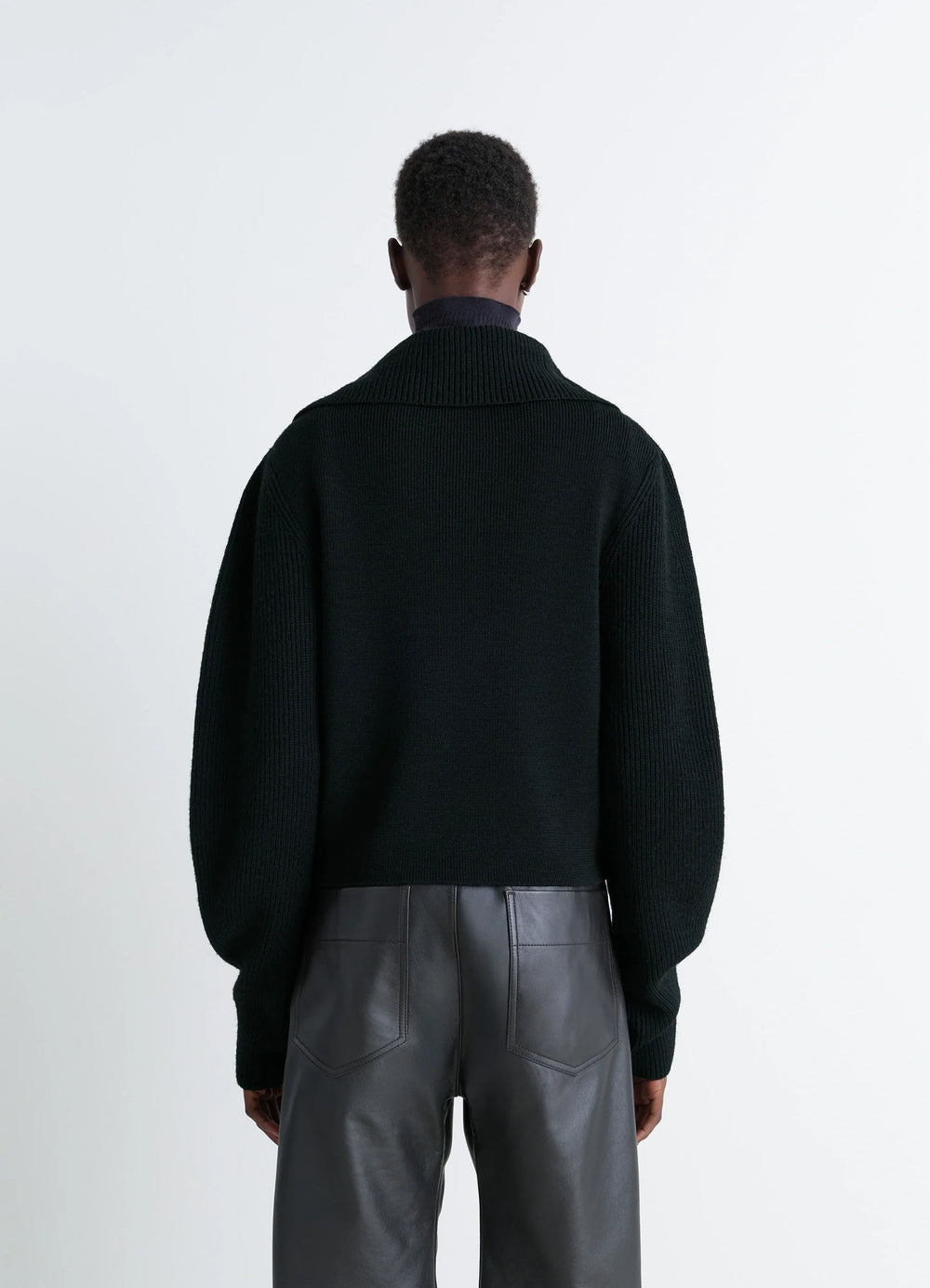 Zipped Sweater in Black Combed Wool, model shot, back view drop shoulder design