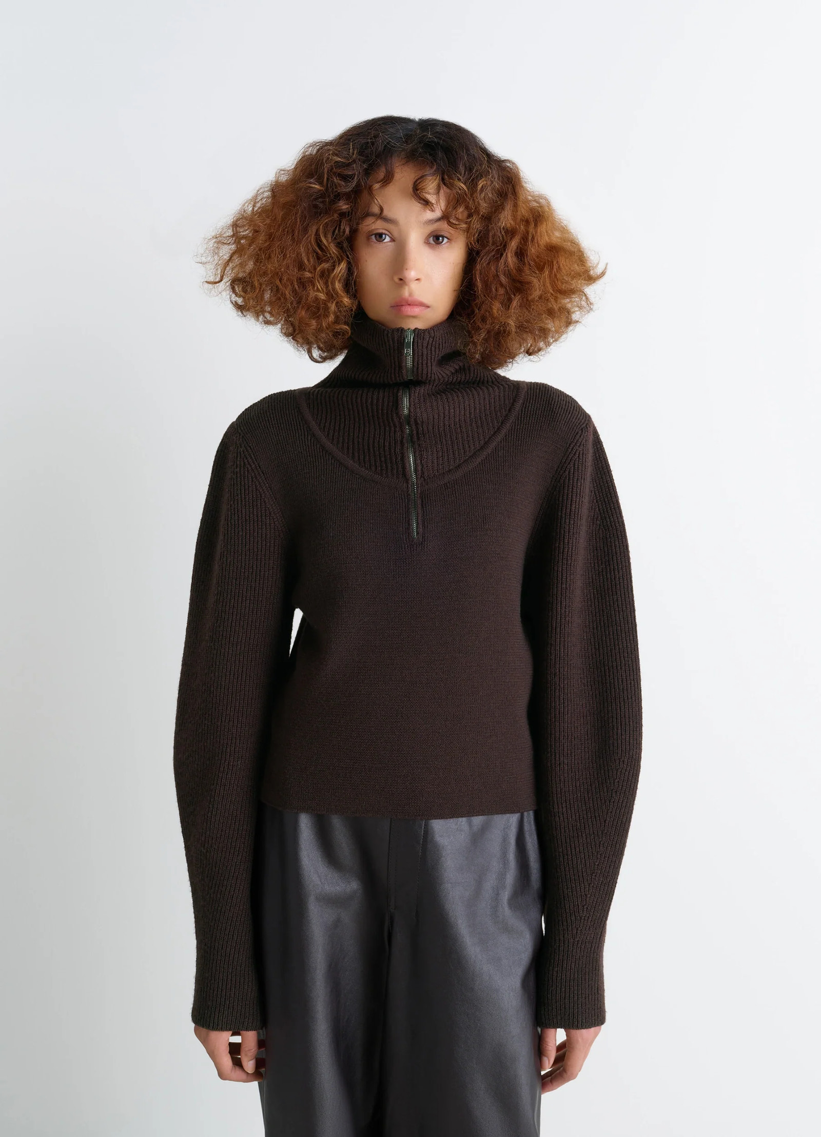 Zipped sweater in combed wool, model shot, front view half-zip textured