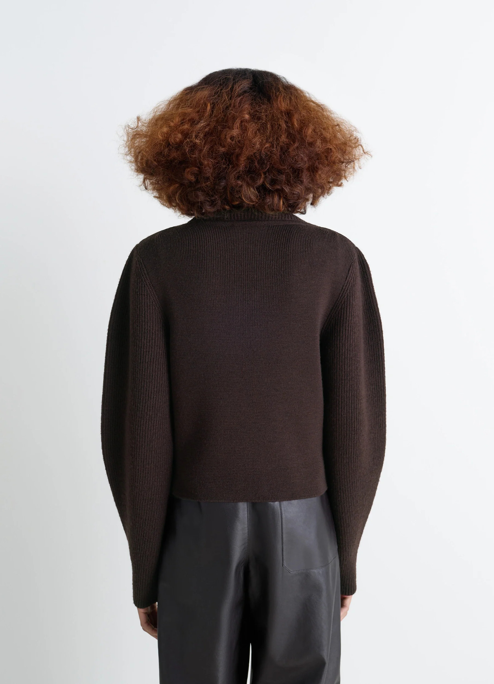 Zipped sweater in combed wool, model shot, back view ribbed sleeve design