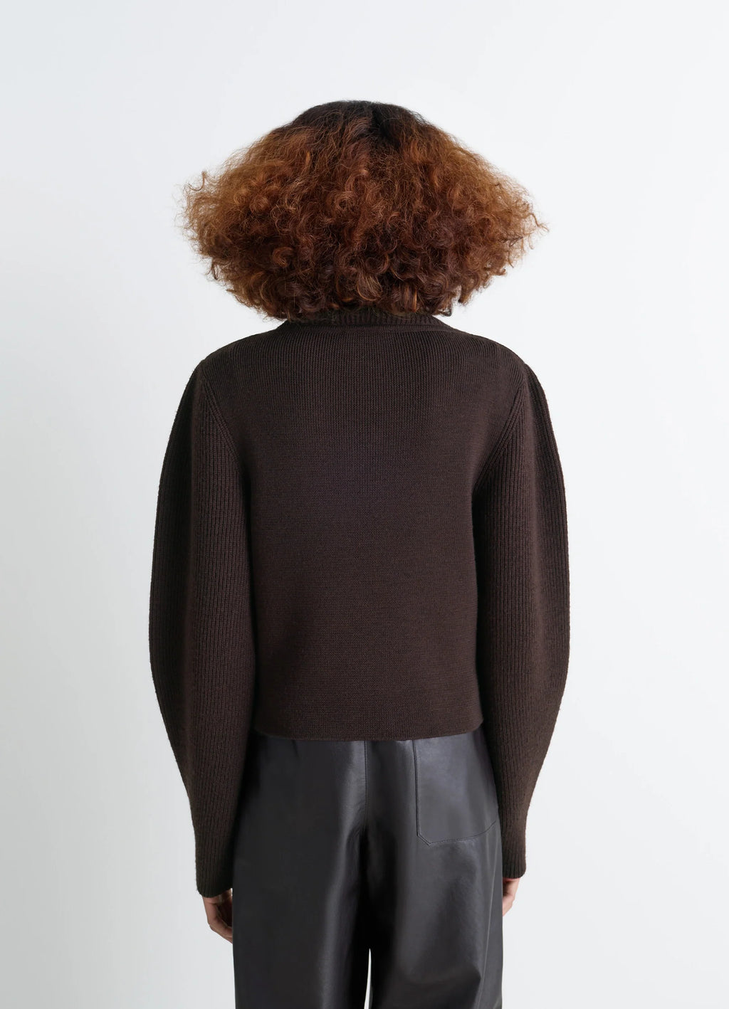 Zipped Sweater in Combed Wool, model shot, back view ribbed sleeve design