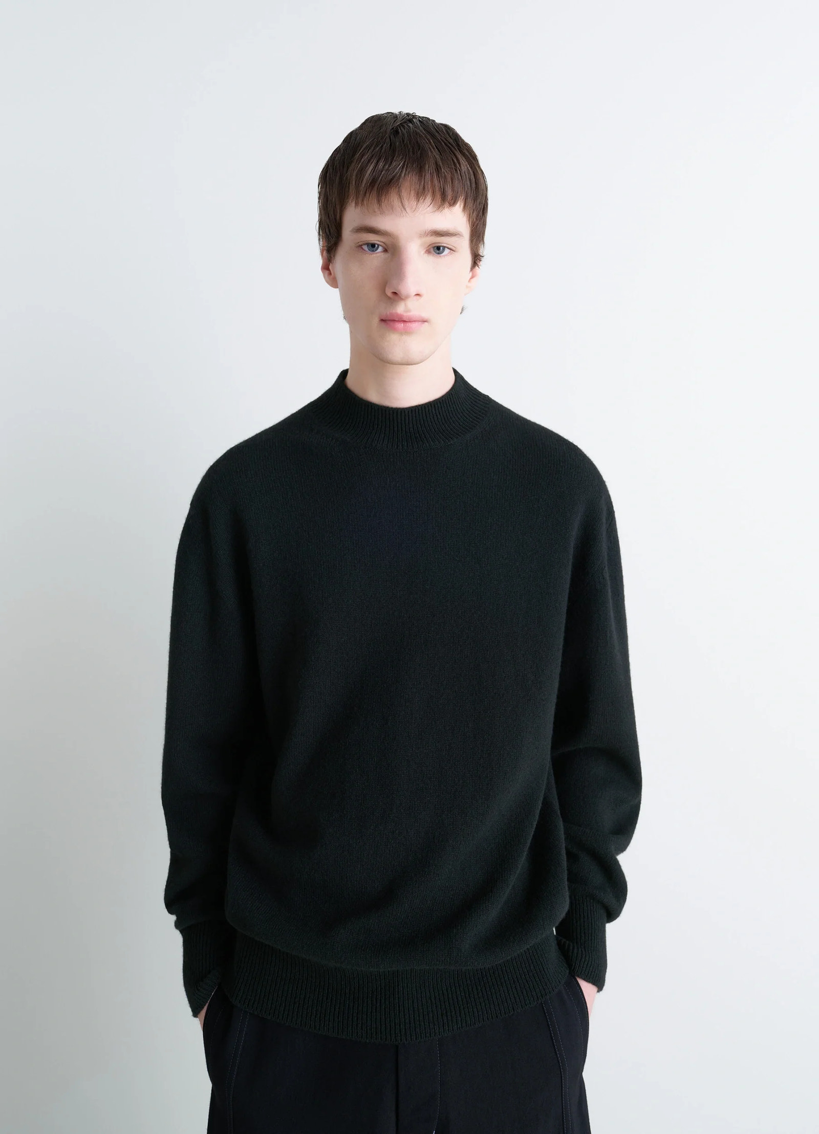 Mock neck sweater in alpaca yak wool, model shot, three-quarter view loose fit