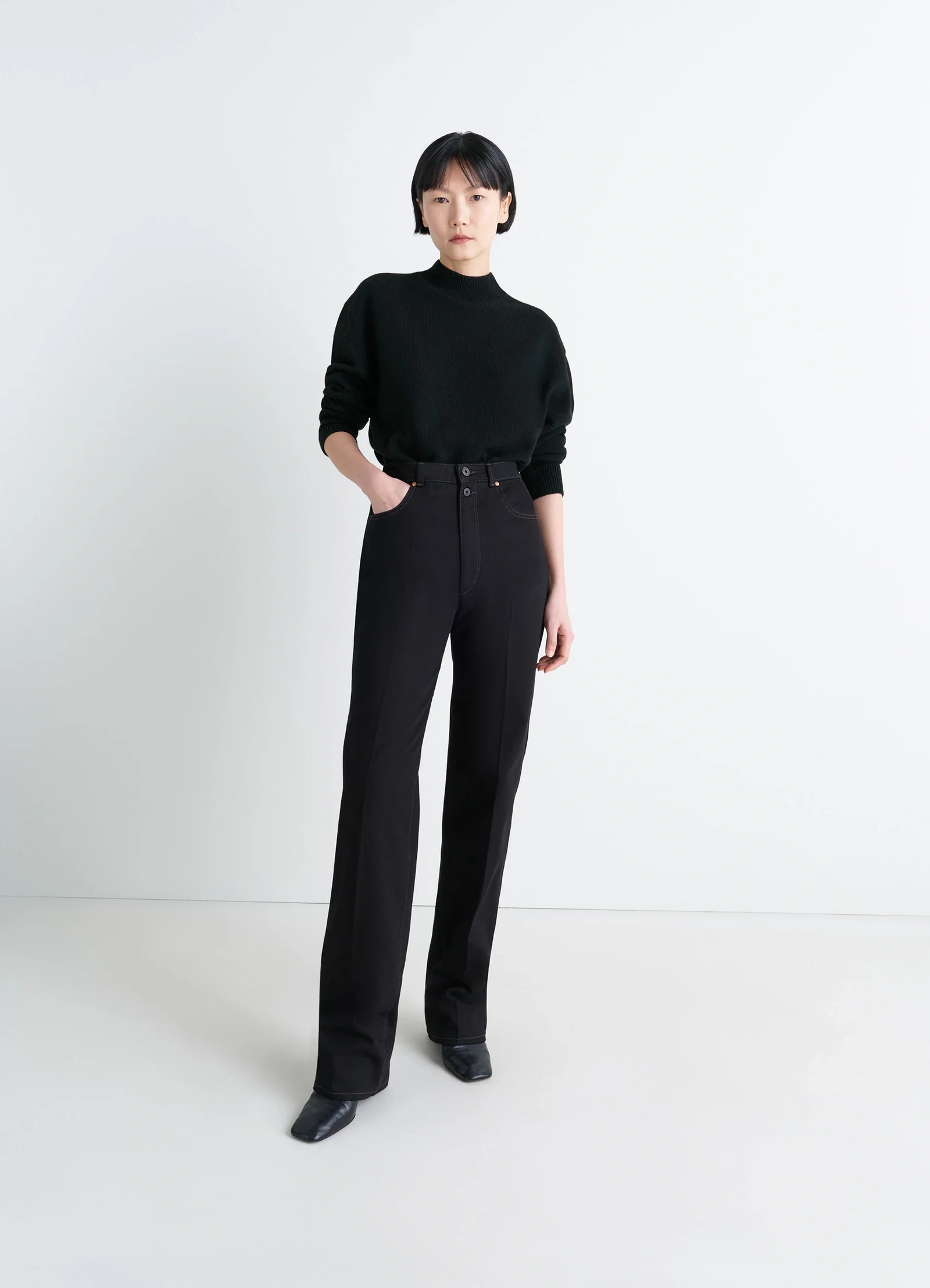 Mock neck sweater in alpaca yak wool, model shot, side view fitted sleeve