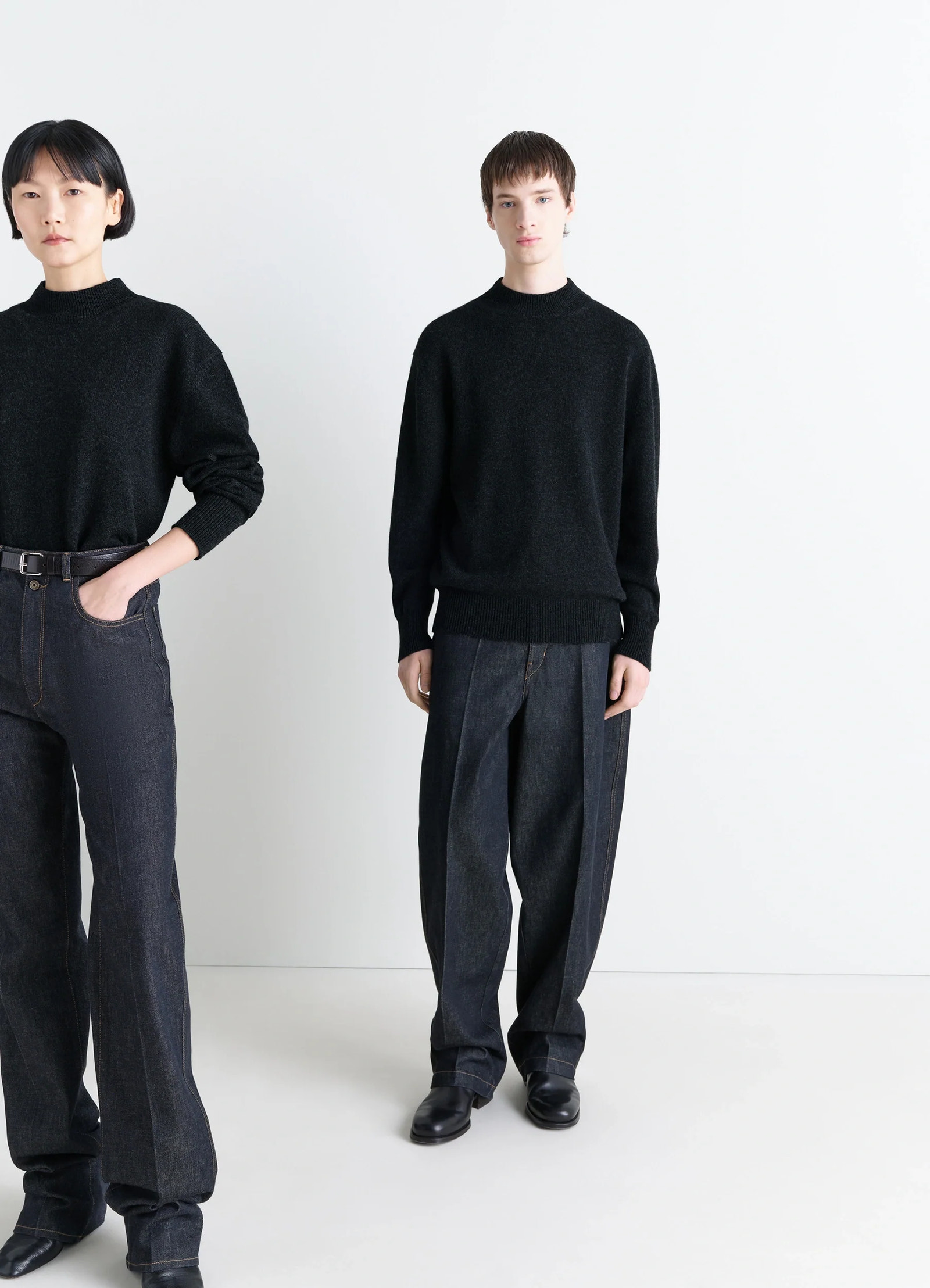 Mock neck sweater in black alpaca yak wool, model shot, front view loose fit