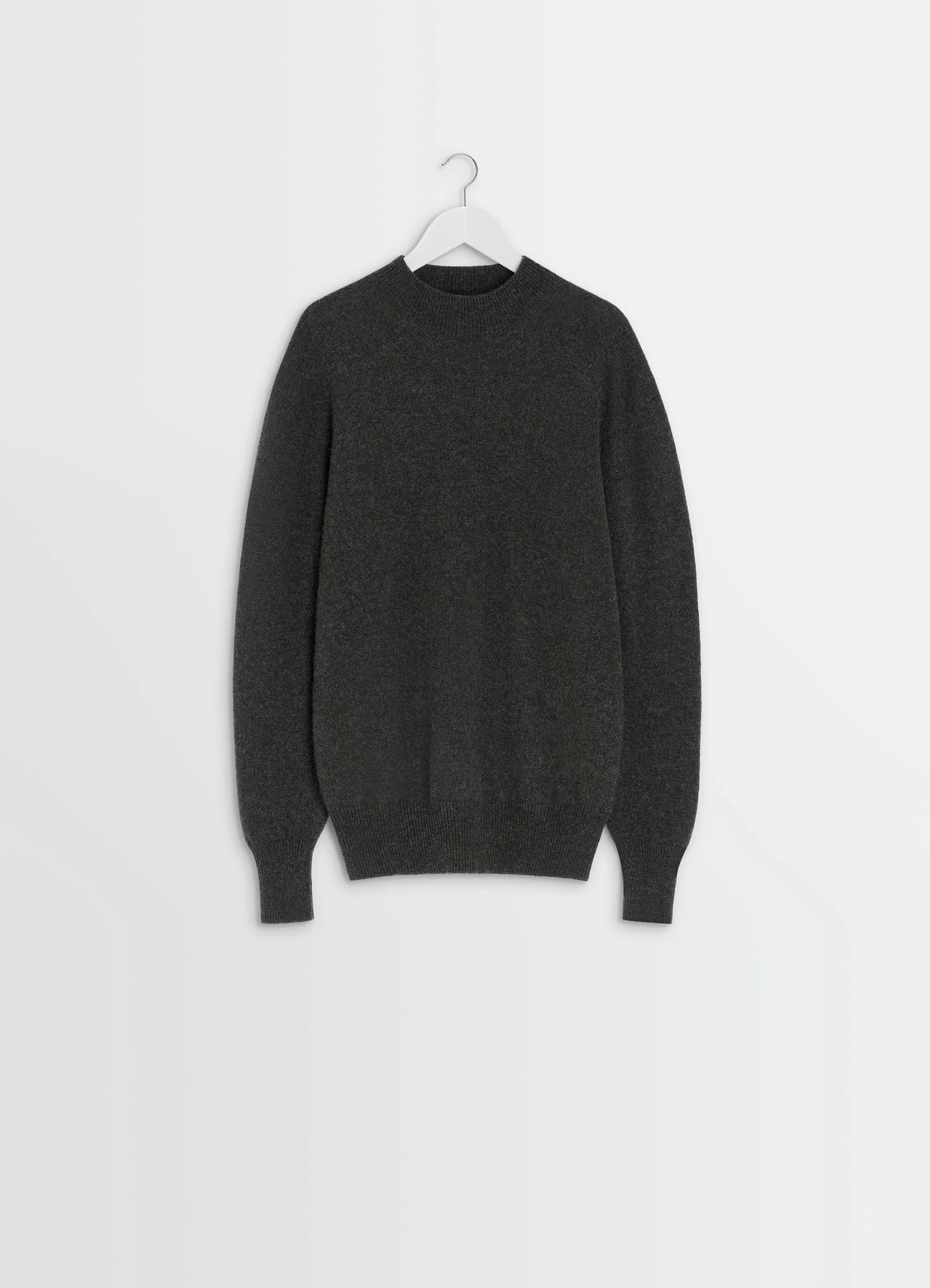 Mock neck sweater in black alpaca yak wool, product shot, hanging display view ribbed neck and hem