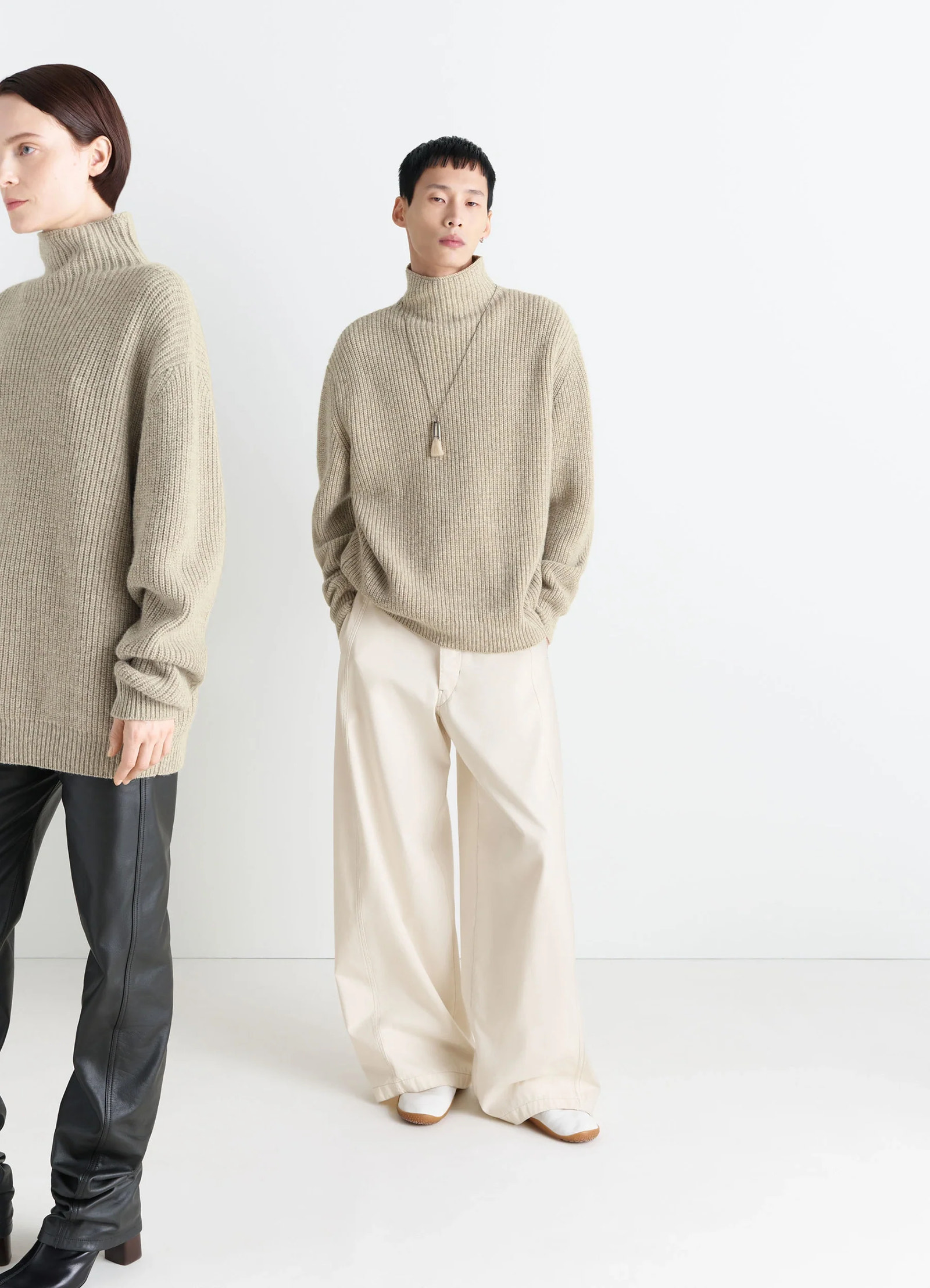 High neck sweater in alpaca yak wool blend, model shot, front view densely ribbed knit