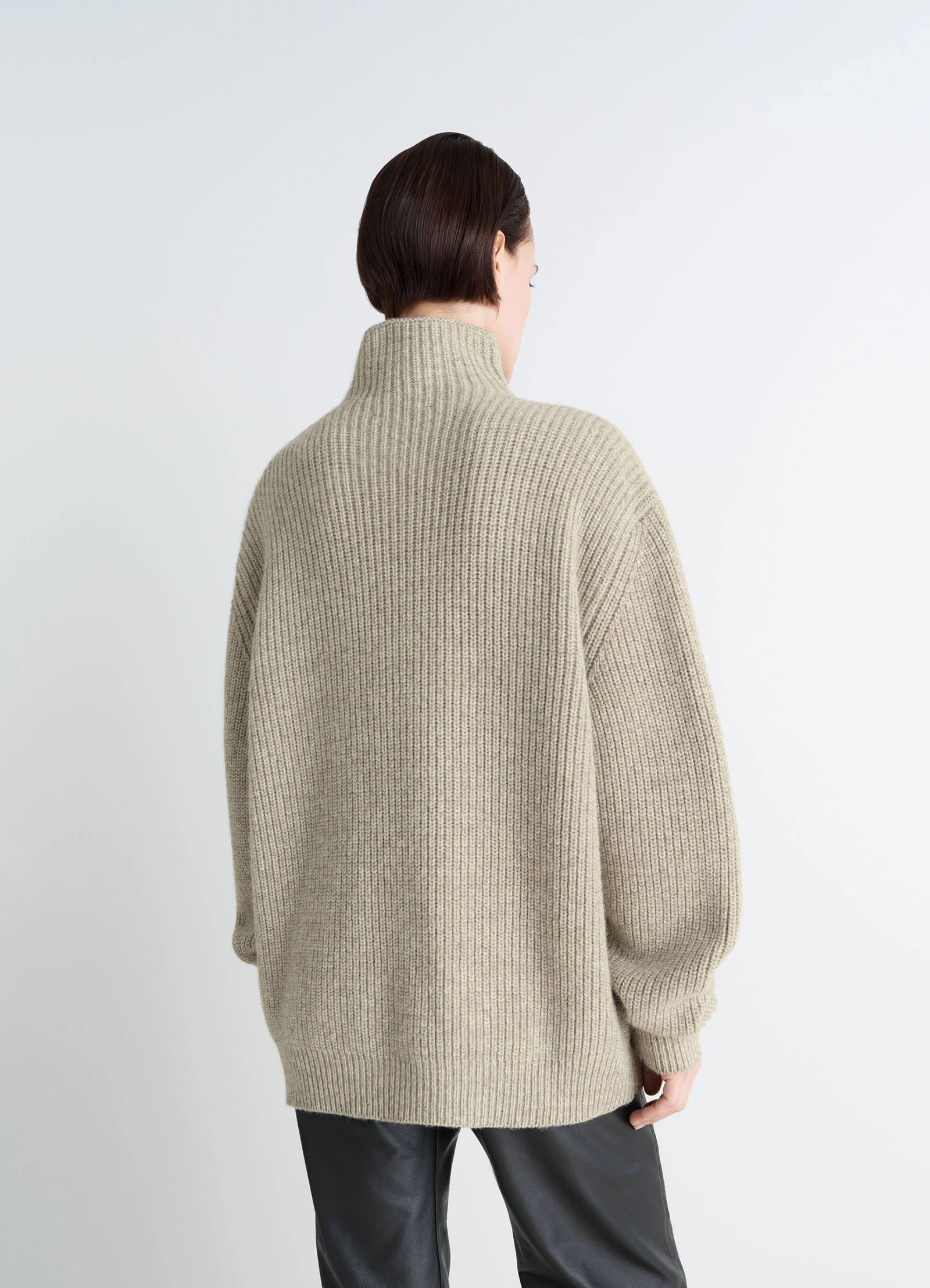 High neck sweater in alpaca yak wool blend, model shot, back view long sleeves, relaxed fit