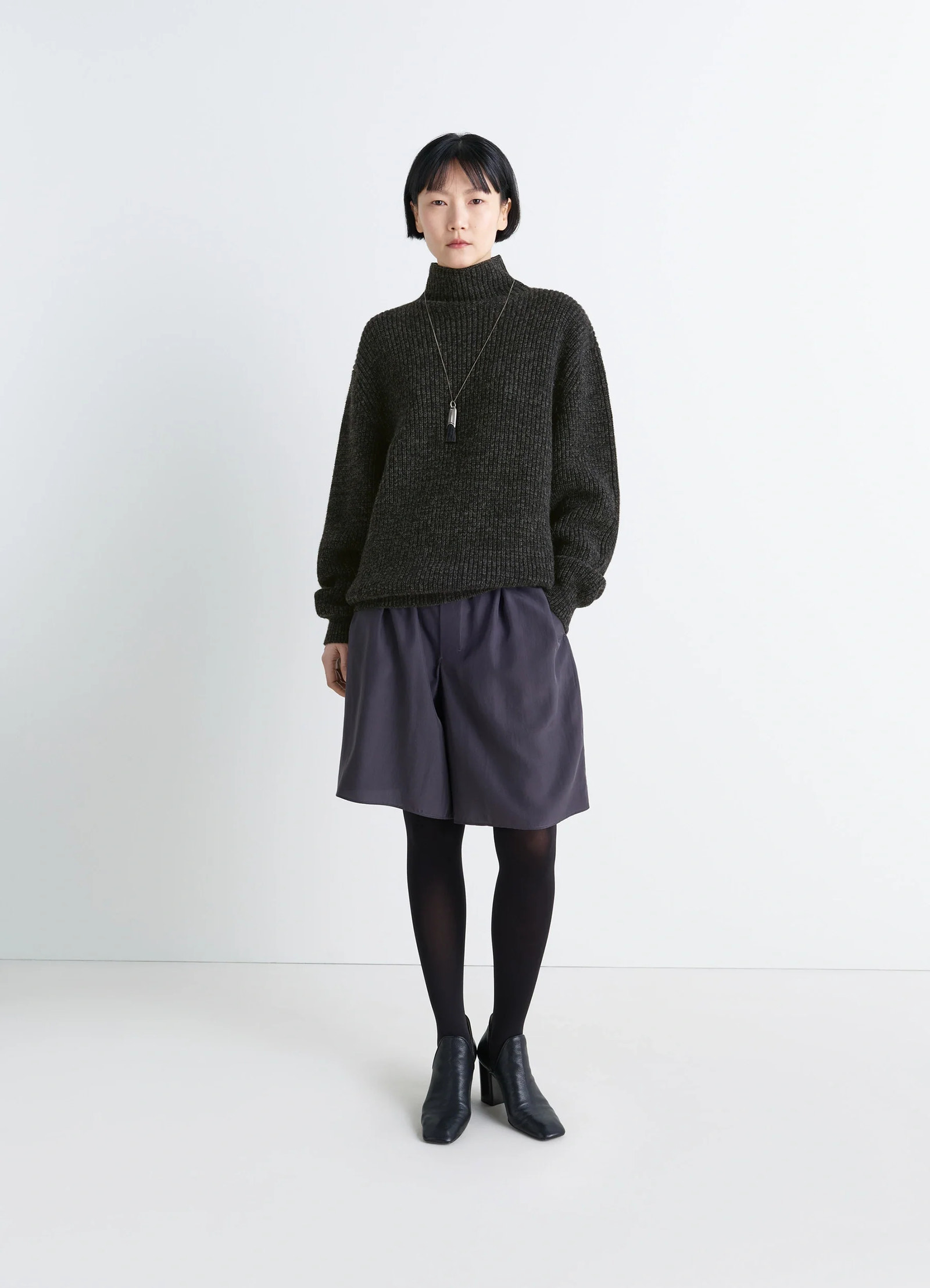 High neck sweater in densely ribbed alpaca yak, model shot, full body front view high neck relaxed fit