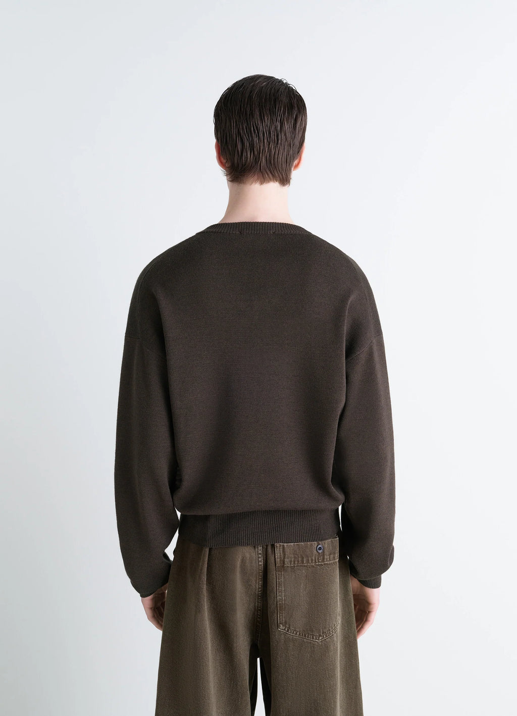 Lemaire V Neck Sweater in Blended Merino Wool, model shot, back view dropped shoulders